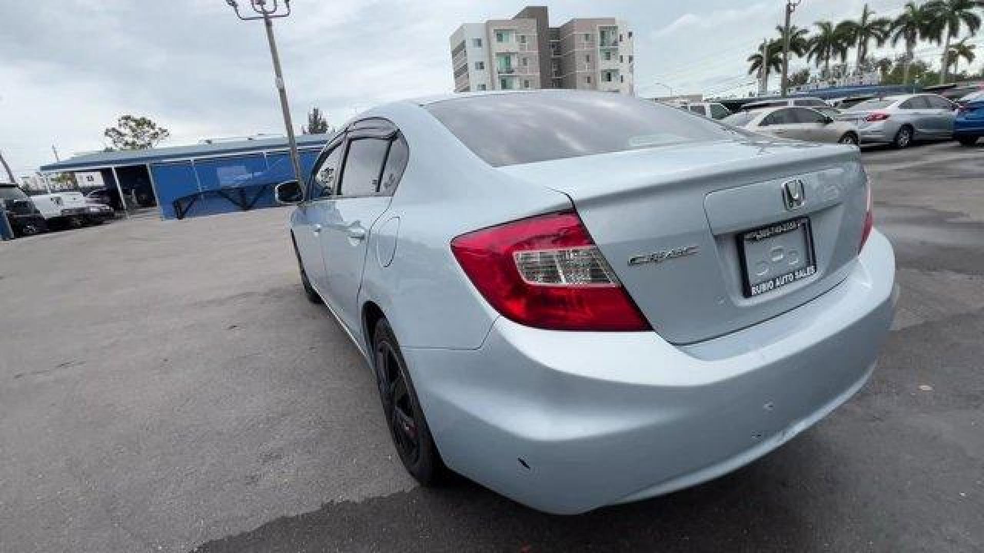 2012 Blue Honda Civic Sdn (19XFB2F80CE) with an 4 1.8L engine, Automatic transmission, located at 27610 S Dixie Hwy, Homestead, FL, 33032, (305) 749-2348, 25.510241, -80.438301 - KBB.com Brand Image Awards. Only 138,421 Miles! Delivers 39 Highway MPG and 28 City MPG! This Honda Civic Sdn delivers a Gas I4 1.8L/110 engine powering this Automatic transmission. Vehicle Stability Assist (VSA) w/traction control, Variable intermittent windshield wipers, USB audio interface.*This - Photo#2