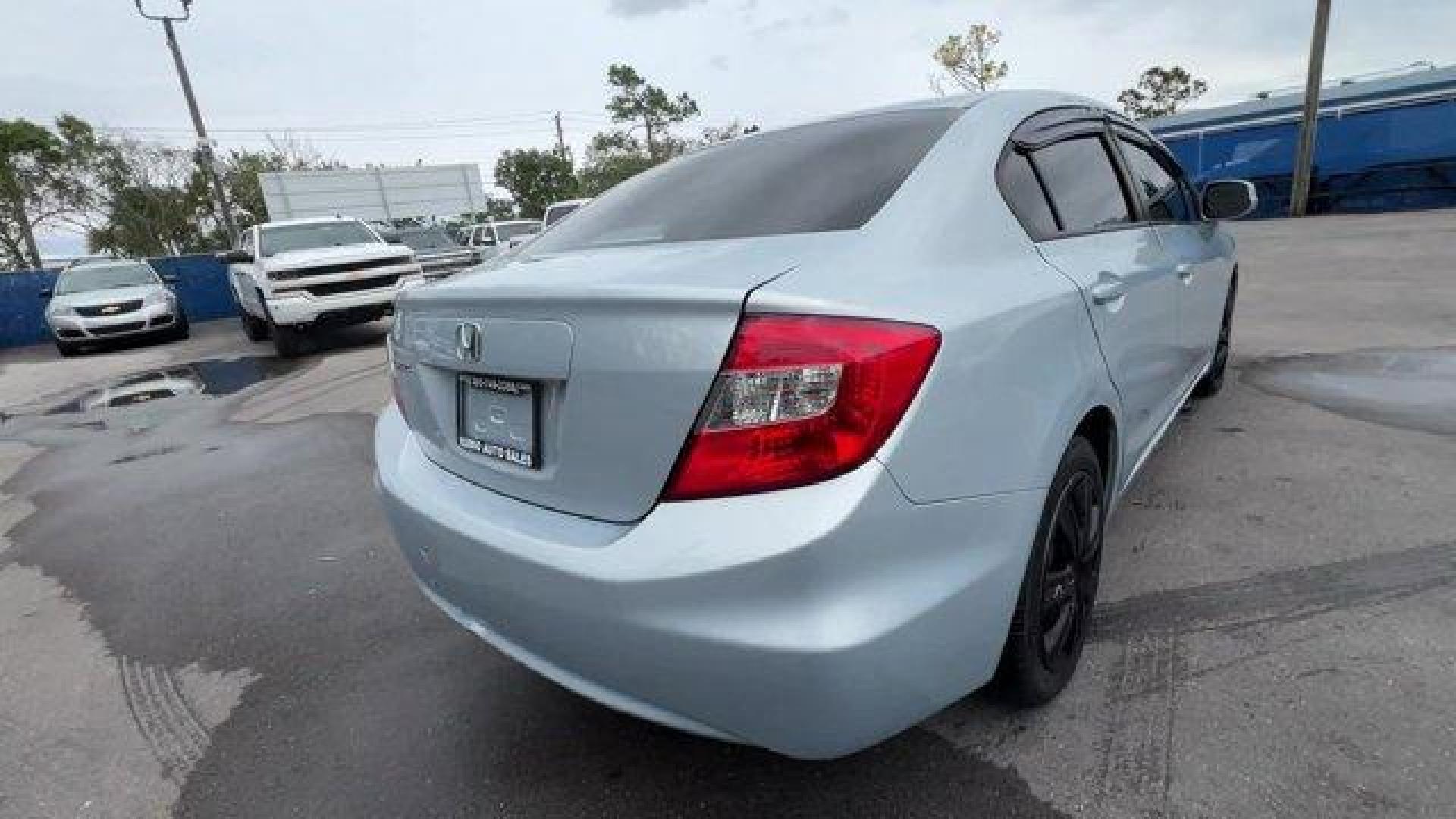 2012 Blue Honda Civic Sdn (19XFB2F80CE) with an 4 1.8L engine, Automatic transmission, located at 27610 S Dixie Hwy, Homestead, FL, 33032, (305) 749-2348, 25.510241, -80.438301 - KBB.com Brand Image Awards. Only 138,421 Miles! Delivers 39 Highway MPG and 28 City MPG! This Honda Civic Sdn delivers a Gas I4 1.8L/110 engine powering this Automatic transmission. Vehicle Stability Assist (VSA) w/traction control, Variable intermittent windshield wipers, USB audio interface.*This - Photo#4