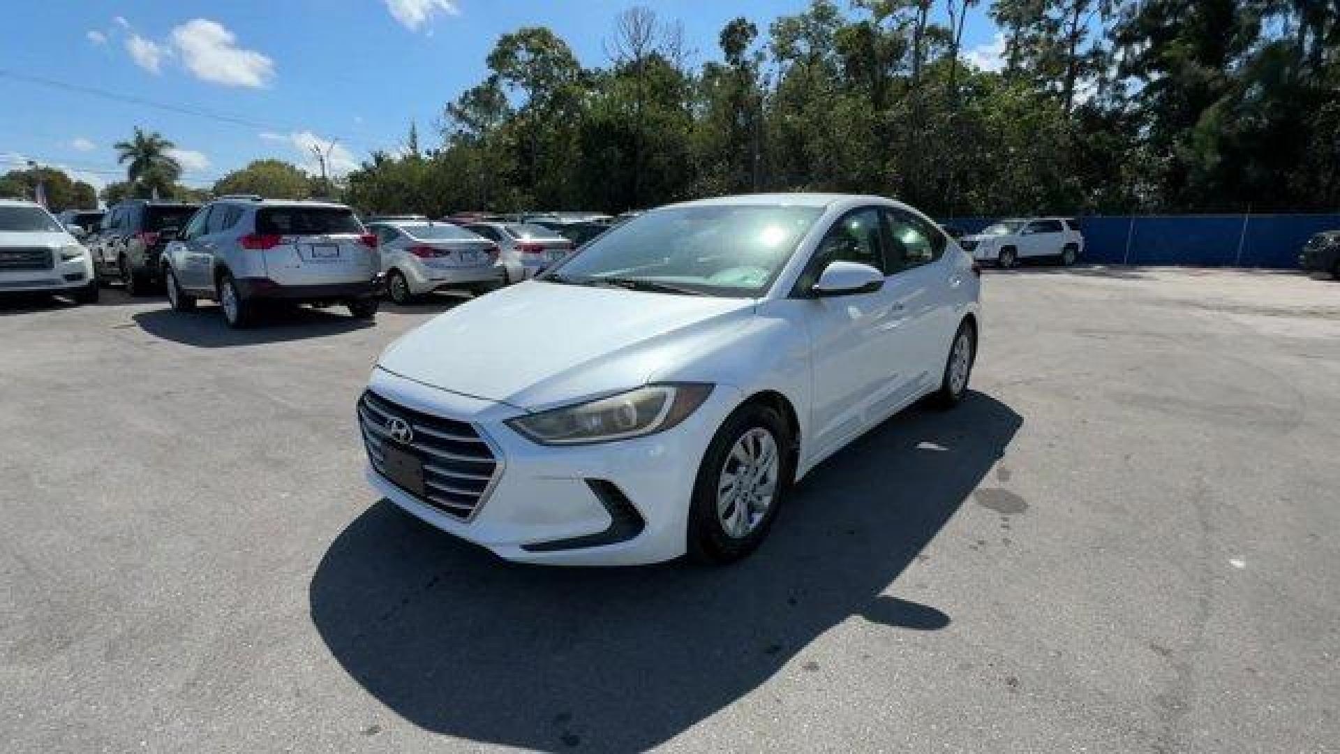 2018 Quartz White Pearl /Black Hyundai Elantra (5NPD74LF6JH) with an 4 2.0 L engine, Automatic transmission, located at 27610 S Dixie Hwy, Homestead, FL, 33032, (305) 749-2348, 25.510241, -80.438301 - KBB.com 10 Best Sedans Under $25,000. Boasts 38 Highway MPG and 29 City MPG! This Hyundai Elantra boasts a Regular Unleaded I-4 2.0 L/122 engine powering this Automatic transmission. QUARTZ WHITE PEARL, FIRST AID KIT, CARPETED FLOOR MATS.*This Hyundai Elantra Comes Equipped with These Options *CARGO - Photo#0