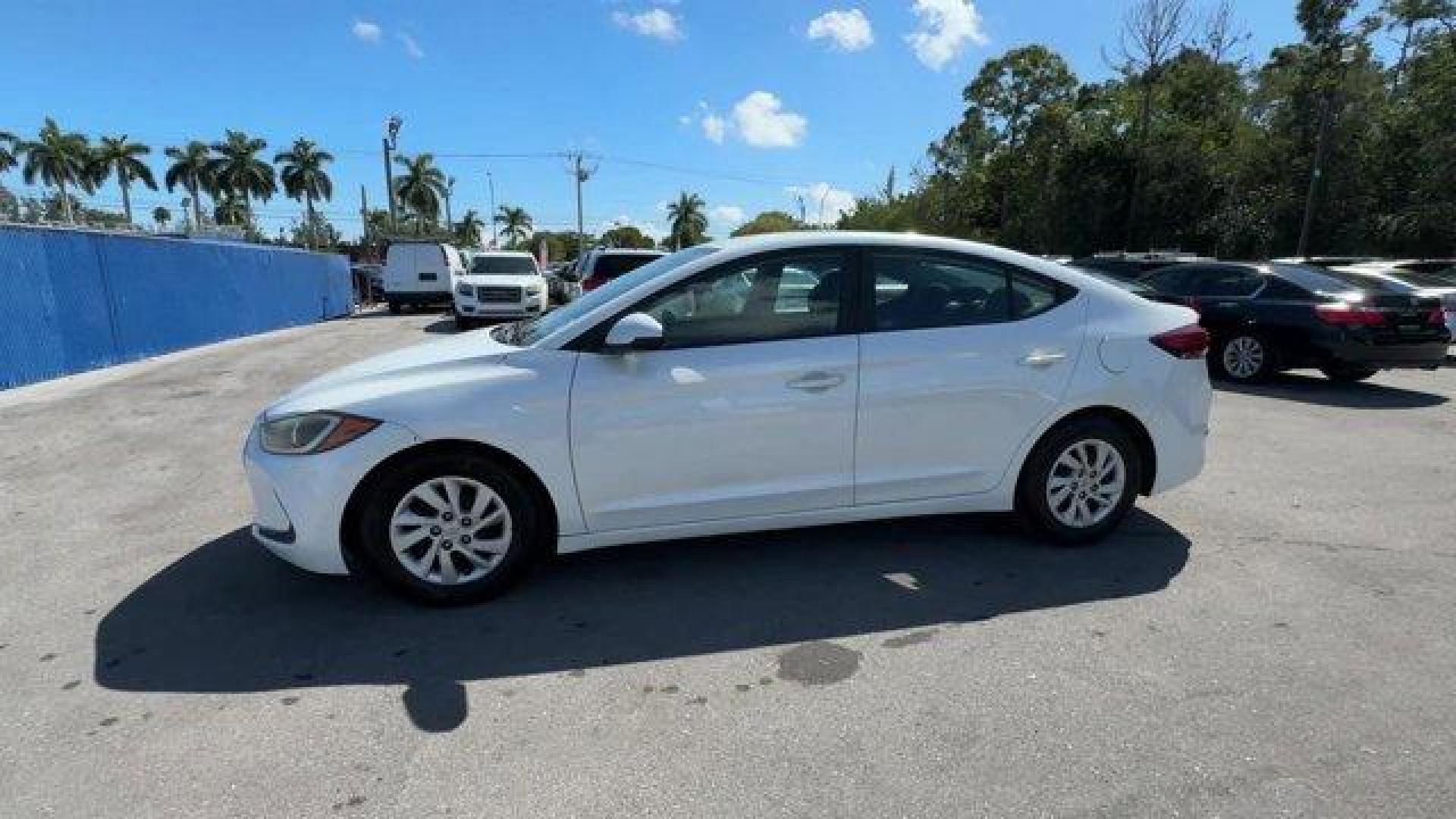 2018 Quartz White Pearl /Black Hyundai Elantra (5NPD74LF6JH) with an 4 2.0 L engine, Automatic transmission, located at 27610 S Dixie Hwy, Homestead, FL, 33032, (305) 749-2348, 25.510241, -80.438301 - KBB.com 10 Best Sedans Under $25,000. Boasts 38 Highway MPG and 29 City MPG! This Hyundai Elantra boasts a Regular Unleaded I-4 2.0 L/122 engine powering this Automatic transmission. QUARTZ WHITE PEARL, FIRST AID KIT, CARPETED FLOOR MATS.*This Hyundai Elantra Comes Equipped with These Options *CARGO - Photo#1