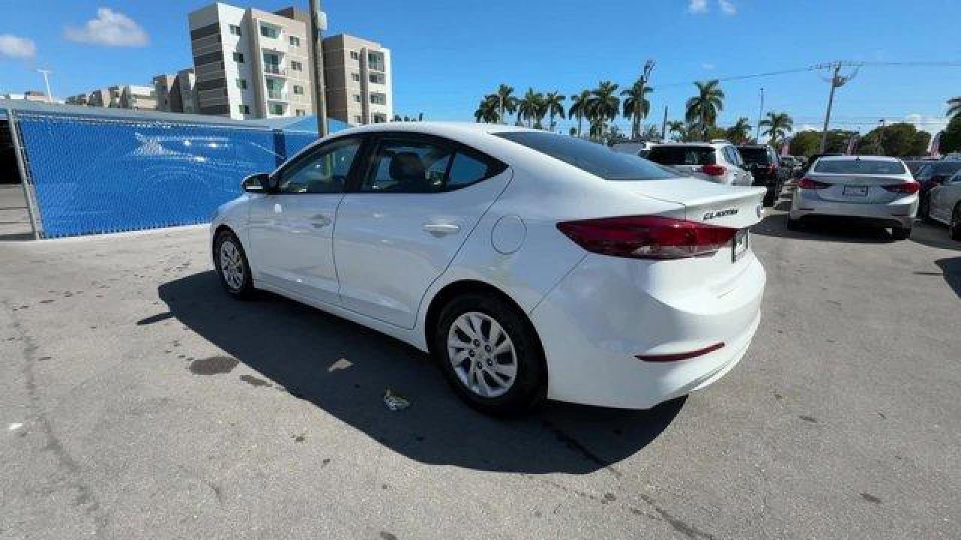 2018 Quartz White Pearl /Black Hyundai Elantra (5NPD74LF6JH) with an 4 2.0 L engine, Automatic transmission, located at 27610 S Dixie Hwy, Homestead, FL, 33032, (305) 749-2348, 25.510241, -80.438301 - KBB.com 10 Best Sedans Under $25,000. Boasts 38 Highway MPG and 29 City MPG! This Hyundai Elantra boasts a Regular Unleaded I-4 2.0 L/122 engine powering this Automatic transmission. QUARTZ WHITE PEARL, FIRST AID KIT, CARPETED FLOOR MATS.*This Hyundai Elantra Comes Equipped with These Options *CARGO - Photo#2