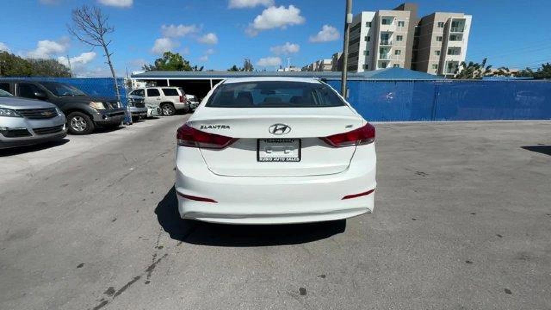 2018 Quartz White Pearl /Black Hyundai Elantra (5NPD74LF6JH) with an 4 2.0 L engine, Automatic transmission, located at 27610 S Dixie Hwy, Homestead, FL, 33032, (305) 749-2348, 25.510241, -80.438301 - KBB.com 10 Best Sedans Under $25,000. Boasts 38 Highway MPG and 29 City MPG! This Hyundai Elantra boasts a Regular Unleaded I-4 2.0 L/122 engine powering this Automatic transmission. QUARTZ WHITE PEARL, FIRST AID KIT, CARPETED FLOOR MATS.*This Hyundai Elantra Comes Equipped with These Options *CARGO - Photo#3