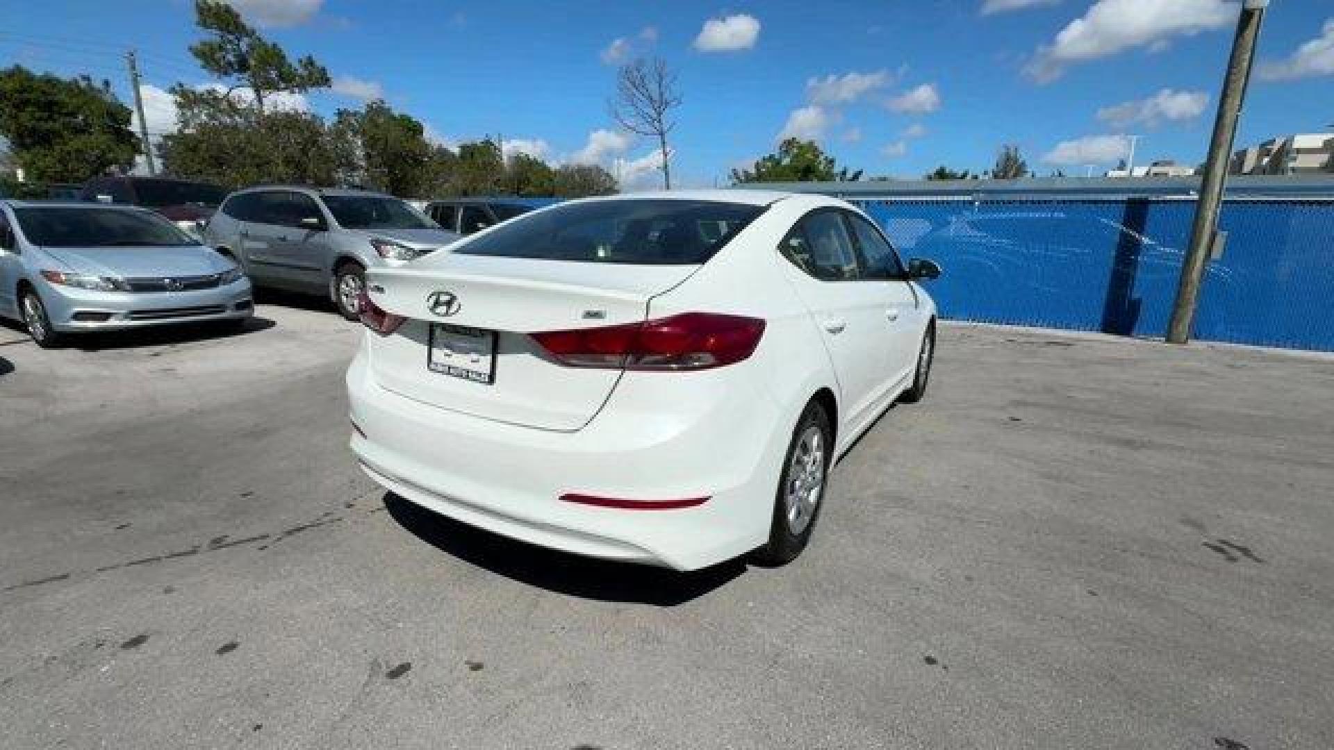 2018 Quartz White Pearl /Black Hyundai Elantra (5NPD74LF6JH) with an 4 2.0 L engine, Automatic transmission, located at 27610 S Dixie Hwy, Homestead, FL, 33032, (305) 749-2348, 25.510241, -80.438301 - KBB.com 10 Best Sedans Under $25,000. Boasts 38 Highway MPG and 29 City MPG! This Hyundai Elantra boasts a Regular Unleaded I-4 2.0 L/122 engine powering this Automatic transmission. QUARTZ WHITE PEARL, FIRST AID KIT, CARPETED FLOOR MATS.*This Hyundai Elantra Comes Equipped with These Options *CARGO - Photo#4