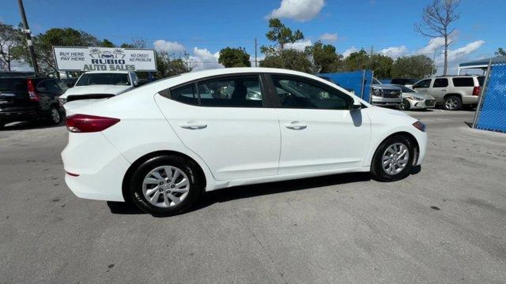 2018 Quartz White Pearl /Black Hyundai Elantra (5NPD74LF6JH) with an 4 2.0 L engine, Automatic transmission, located at 27610 S Dixie Hwy, Homestead, FL, 33032, (305) 749-2348, 25.510241, -80.438301 - KBB.com 10 Best Sedans Under $25,000. Boasts 38 Highway MPG and 29 City MPG! This Hyundai Elantra boasts a Regular Unleaded I-4 2.0 L/122 engine powering this Automatic transmission. QUARTZ WHITE PEARL, FIRST AID KIT, CARPETED FLOOR MATS.*This Hyundai Elantra Comes Equipped with These Options *CARGO - Photo#5