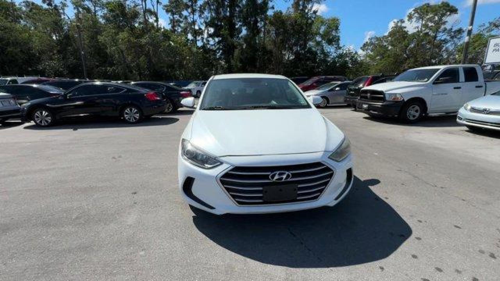 2018 Quartz White Pearl /Black Hyundai Elantra (5NPD74LF6JH) with an 4 2.0 L engine, Automatic transmission, located at 27610 S Dixie Hwy, Homestead, FL, 33032, (305) 749-2348, 25.510241, -80.438301 - KBB.com 10 Best Sedans Under $25,000. Boasts 38 Highway MPG and 29 City MPG! This Hyundai Elantra boasts a Regular Unleaded I-4 2.0 L/122 engine powering this Automatic transmission. QUARTZ WHITE PEARL, FIRST AID KIT, CARPETED FLOOR MATS.*This Hyundai Elantra Comes Equipped with These Options *CARGO - Photo#7