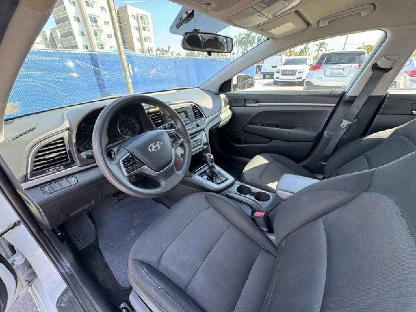 2018 Quartz White Pearl /Black Hyundai Elantra (5NPD74LF6JH) with an 4 2.0 L engine, Automatic transmission, located at 27610 S Dixie Hwy, Homestead, FL, 33032, (305) 749-2348, 25.510241, -80.438301 - KBB.com 10 Best Sedans Under $25,000. Boasts 38 Highway MPG and 29 City MPG! This Hyundai Elantra boasts a Regular Unleaded I-4 2.0 L/122 engine powering this Automatic transmission. QUARTZ WHITE PEARL, FIRST AID KIT, CARPETED FLOOR MATS.*This Hyundai Elantra Comes Equipped with These Options *CARGO - Photo#10