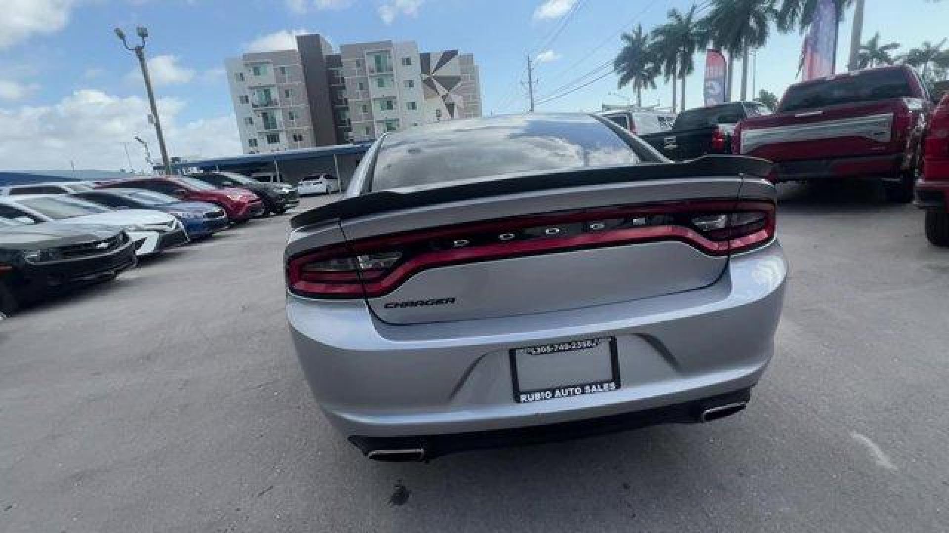 2016 Billet Clearcoat /Black Dodge Charger (2C3CDXBG4GH) with an 6 3.6 L engine, Automatic transmission, located at 27610 S Dixie Hwy, Homestead, FL, 33032, (305) 749-2348, 25.510241, -80.438301 - KBB.com 10 Best Used Cars Under $20,000. Only 69,245 Miles! Delivers 31 Highway MPG and 19 City MPG! This Dodge Charger delivers a Regular Unleaded V-6 3.6 L/220 engine powering this Automatic transmission. WHEELS: 20 X 8.0 GLOSS BLACK PAINTED ALUMINUM, TRANSMISSION: 8-SPEED AUTO (8HP45) (STD), TIRE - Photo#3