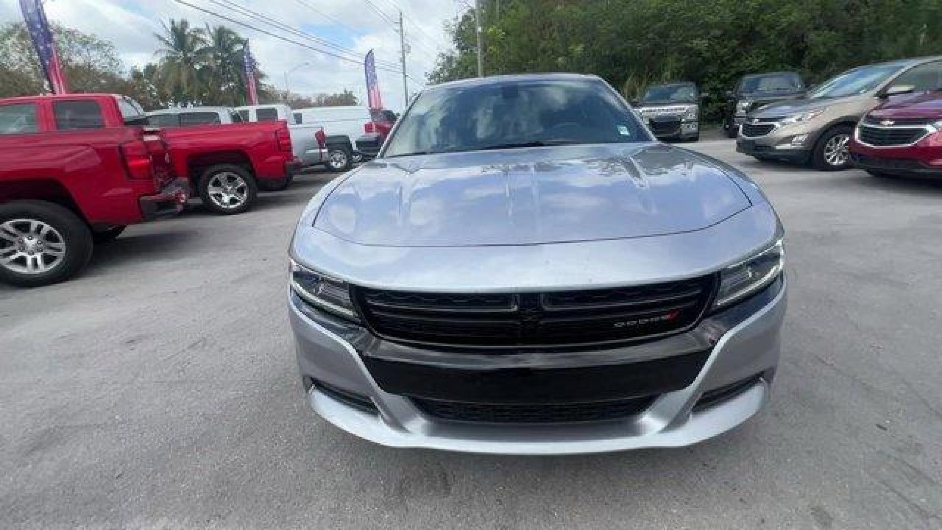 2016 Billet Clearcoat /Black Dodge Charger (2C3CDXBG4GH) with an 6 3.6 L engine, Automatic transmission, located at 27610 S Dixie Hwy, Homestead, FL, 33032, (305) 749-2348, 25.510241, -80.438301 - KBB.com 10 Best Used Cars Under $20,000. Only 69,245 Miles! Delivers 31 Highway MPG and 19 City MPG! This Dodge Charger delivers a Regular Unleaded V-6 3.6 L/220 engine powering this Automatic transmission. WHEELS: 20 X 8.0 GLOSS BLACK PAINTED ALUMINUM, TRANSMISSION: 8-SPEED AUTO (8HP45) (STD), TIRE - Photo#7