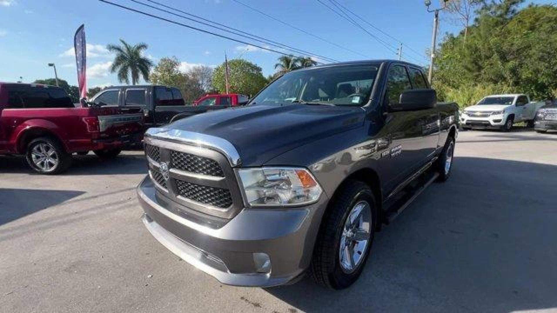 2017 Granite Crystal Metallic Clearcoat /Diesel Gray/Black Ram 1500 (1C6RR6FT4HS) with an 8 5.7 L engine, Automatic transmission, located at 27610 S Dixie Hwy, Homestead, FL, 33032, (305) 749-2348, 25.510241, -80.438301 - Delivers 22 Highway MPG and 15 City MPG! This Ram 1500 boasts a Regular Unleaded V-8 5.7 L/345 engine powering this Automatic transmission. WHEELS: 20 X 9 ALUMINUM CHROME CLAD -inc: Tires: P275/60R20 OWL AS, Full Size Temporary Use Spare Tire, TRANSMISSION: 8-SPEED AUTOMATIC (8HP70), TIRES: P275/60R - Photo#0