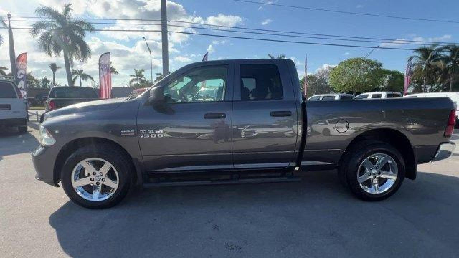 2017 Granite Crystal Metallic Clearcoat /Diesel Gray/Black Ram 1500 (1C6RR6FT4HS) with an 8 5.7 L engine, Automatic transmission, located at 27610 S Dixie Hwy, Homestead, FL, 33032, (305) 749-2348, 25.510241, -80.438301 - Delivers 22 Highway MPG and 15 City MPG! This Ram 1500 boasts a Regular Unleaded V-8 5.7 L/345 engine powering this Automatic transmission. WHEELS: 20 X 9 ALUMINUM CHROME CLAD -inc: Tires: P275/60R20 OWL AS, Full Size Temporary Use Spare Tire, TRANSMISSION: 8-SPEED AUTOMATIC (8HP70), TIRES: P275/60R - Photo#1