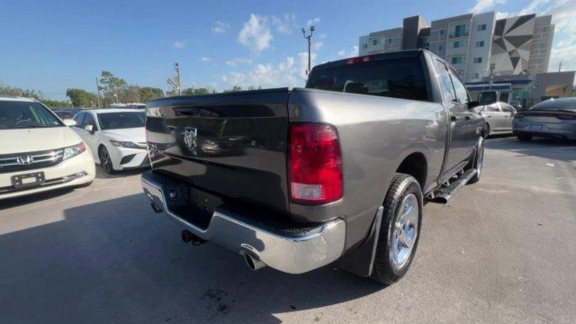 2017 Granite Crystal Metallic Clearcoat /Diesel Gray/Black Ram 1500 (1C6RR6FT4HS) with an 8 5.7 L engine, Automatic transmission, located at 27610 S Dixie Hwy, Homestead, FL, 33032, (305) 749-2348, 25.510241, -80.438301 - Delivers 22 Highway MPG and 15 City MPG! This Ram 1500 boasts a Regular Unleaded V-8 5.7 L/345 engine powering this Automatic transmission. WHEELS: 20 X 9 ALUMINUM CHROME CLAD -inc: Tires: P275/60R20 OWL AS, Full Size Temporary Use Spare Tire, TRANSMISSION: 8-SPEED AUTOMATIC (8HP70), TIRES: P275/60R - Photo#4