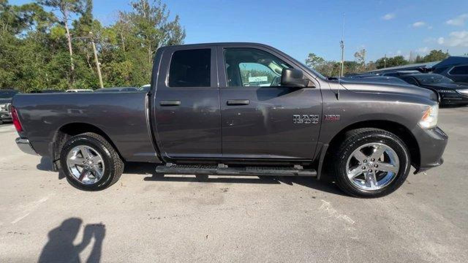 2017 Granite Crystal Metallic Clearcoat /Diesel Gray/Black Ram 1500 (1C6RR6FT4HS) with an 8 5.7 L engine, Automatic transmission, located at 27610 S Dixie Hwy, Homestead, FL, 33032, (305) 749-2348, 25.510241, -80.438301 - Delivers 22 Highway MPG and 15 City MPG! This Ram 1500 boasts a Regular Unleaded V-8 5.7 L/345 engine powering this Automatic transmission. WHEELS: 20 X 9 ALUMINUM CHROME CLAD -inc: Tires: P275/60R20 OWL AS, Full Size Temporary Use Spare Tire, TRANSMISSION: 8-SPEED AUTOMATIC (8HP70), TIRES: P275/60R - Photo#5