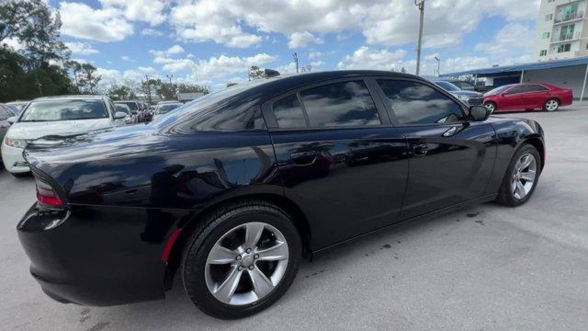 2016 Pitch Black Clearcoat /Black Dodge Charger (2C3CDXHG3GH) with an 6 3.6 L engine, Automatic transmission, located at 27610 S Dixie Hwy, Homestead, FL, 33032, (305) 749-2348, 25.510241, -80.438301 - KBB.com 10 Best Used Cars Under $20,000. Boasts 31 Highway MPG and 19 City MPG! This Dodge Charger boasts a Regular Unleaded V-6 3.6 L/220 engine powering this Automatic transmission. WHEELS: 18 X 7.5 CAST ALUMINUM (STD), TRANSMISSION: 8-SPEED AUTO (8HP45) (STD), TIRES: P235/55R18 AS PERFORMANCE (ST - Photo#3