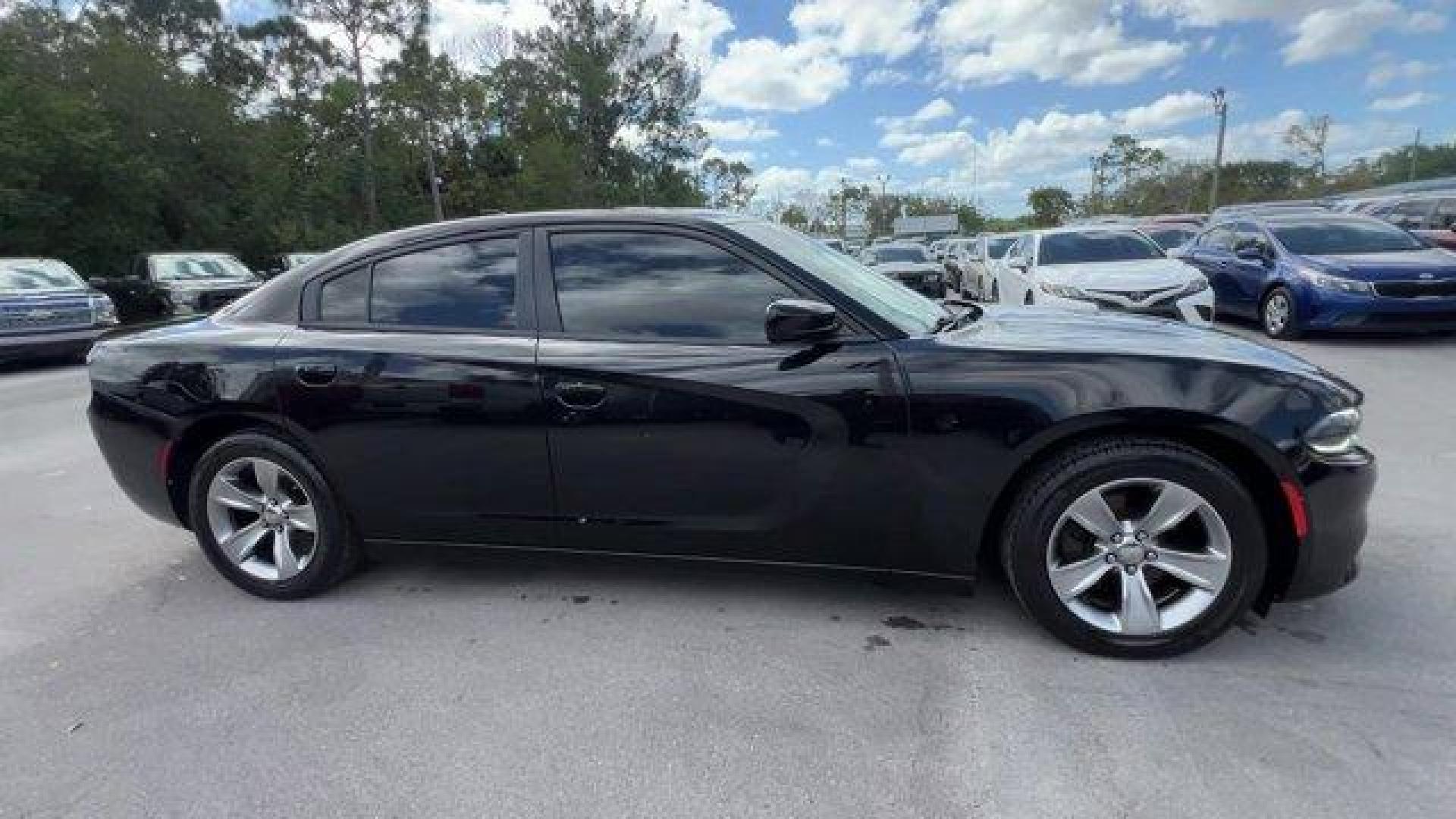 2016 Pitch Black Clearcoat /Black Dodge Charger (2C3CDXHG3GH) with an 6 3.6 L engine, Automatic transmission, located at 27610 S Dixie Hwy, Homestead, FL, 33032, (305) 749-2348, 25.510241, -80.438301 - KBB.com 10 Best Used Cars Under $20,000. Boasts 31 Highway MPG and 19 City MPG! This Dodge Charger boasts a Regular Unleaded V-6 3.6 L/220 engine powering this Automatic transmission. WHEELS: 18 X 7.5 CAST ALUMINUM (STD), TRANSMISSION: 8-SPEED AUTO (8HP45) (STD), TIRES: P235/55R18 AS PERFORMANCE (ST - Photo#4