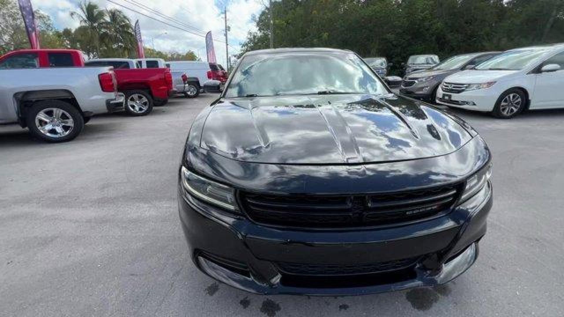 2016 Pitch Black Clearcoat /Black Dodge Charger (2C3CDXHG3GH) with an 6 3.6 L engine, Automatic transmission, located at 27610 S Dixie Hwy, Homestead, FL, 33032, (305) 749-2348, 25.510241, -80.438301 - KBB.com 10 Best Used Cars Under $20,000. Boasts 31 Highway MPG and 19 City MPG! This Dodge Charger boasts a Regular Unleaded V-6 3.6 L/220 engine powering this Automatic transmission. WHEELS: 18 X 7.5 CAST ALUMINUM (STD), TRANSMISSION: 8-SPEED AUTO (8HP45) (STD), TIRES: P235/55R18 AS PERFORMANCE (ST - Photo#6