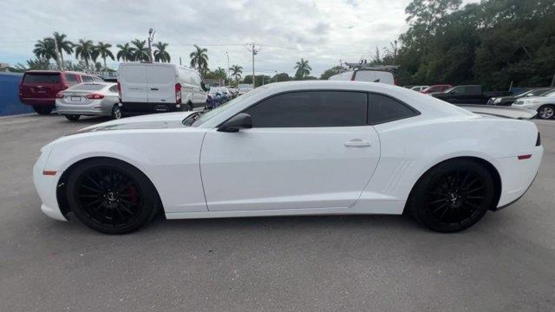 2015 Summit White /Black Chevrolet Camaro (2G1FB1E31F9) with an 6 3.6L engine, Automatic transmission, located at 27610 S Dixie Hwy, Homestead, FL, 33032, (305) 749-2348, 25.510241, -80.438301 - KBB.com Best Buy Awards Finalist. Only 86,689 Miles! Delivers 30 Highway MPG and 19 City MPG! This Chevrolet Camaro delivers a Gas V6 3.6L/217 engine powering this Automatic transmission. WHEELS, 18 (45.7 CM) PAINTED ALUMINUM (STD), WHEEL AND TIRE, SPARE, COMPACT includes 18 (45.7 cm) steel spare wh - Photo#1