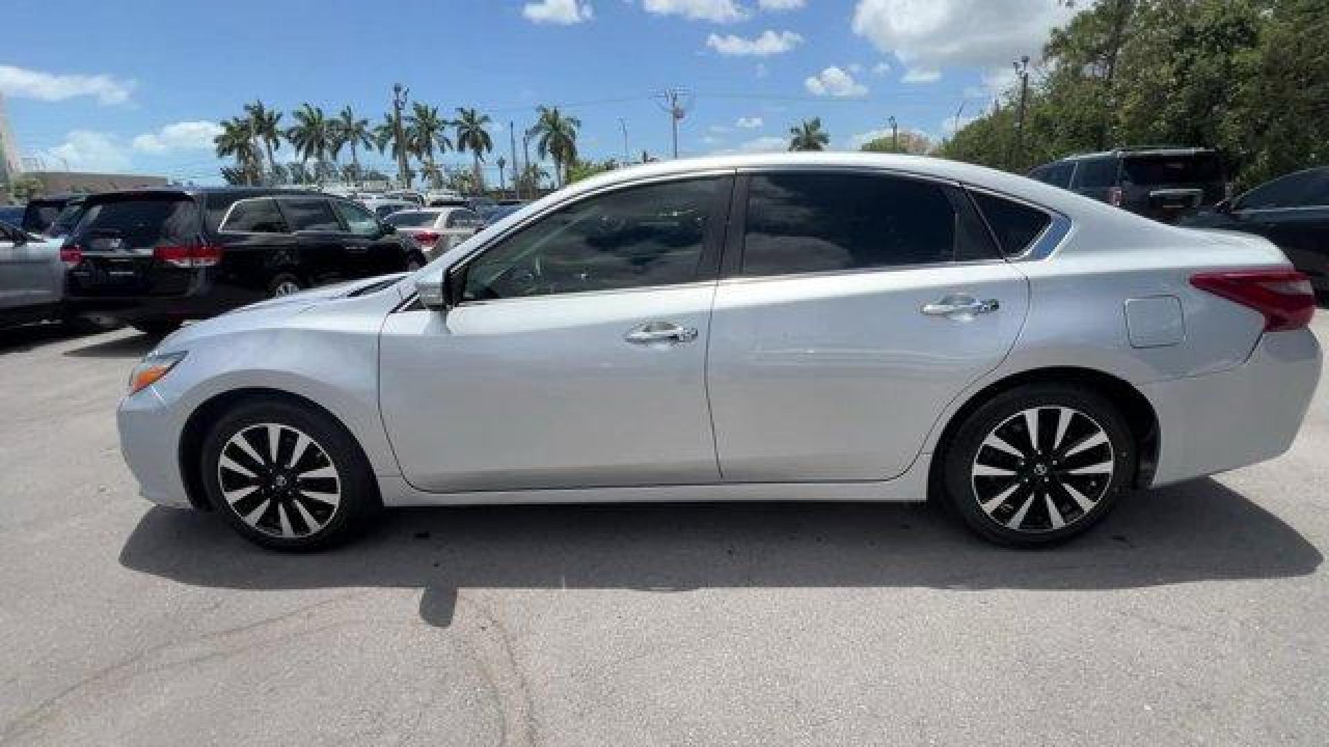 2018 Brilliant Silver /Charcoal Nissan Altima (1N4AL3AP7JC) with an 4 2.5 L engine, Variable transmission, located at 27610 S Dixie Hwy, Homestead, FL, 33032, (305) 749-2348, 25.510241, -80.438301 - Delivers 38 Highway MPG and 27 City MPG! This Nissan Altima boasts a Regular Unleaded I-4 2.5 L/152 engine powering this Variable transmission. CHARCOAL, LEATHER APPOINTED SEAT TRIM, BRILLIANT SILVER, [Z66] ACTIVATION DISCLAIMER.*This Nissan Altima Comes Equipped with These Options *[L92] FLOOR MATS - Photo#0