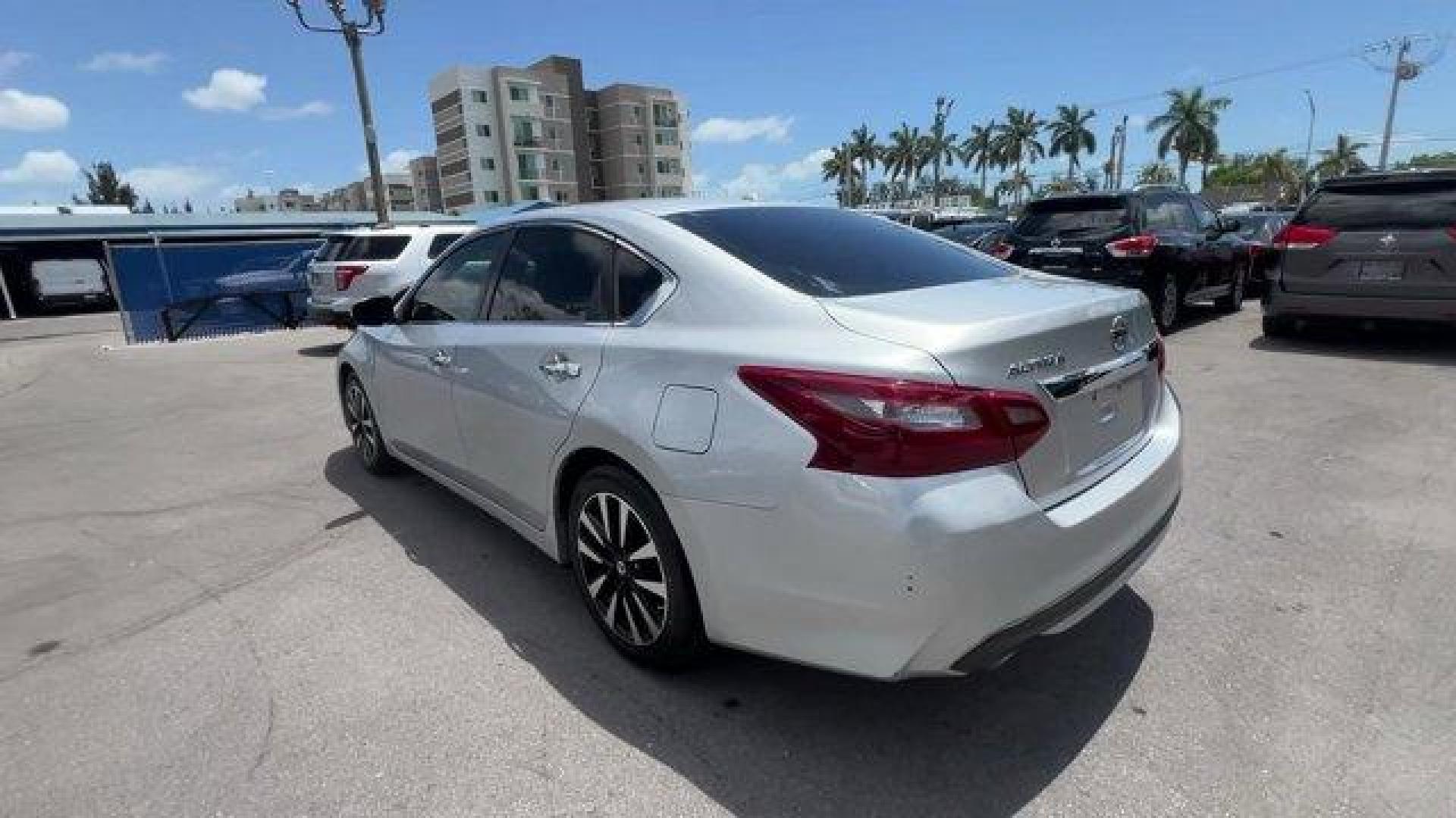 2018 Brilliant Silver /Charcoal Nissan Altima (1N4AL3AP7JC) with an 4 2.5 L engine, Variable transmission, located at 27610 S Dixie Hwy, Homestead, FL, 33032, (305) 749-2348, 25.510241, -80.438301 - Delivers 38 Highway MPG and 27 City MPG! This Nissan Altima boasts a Regular Unleaded I-4 2.5 L/152 engine powering this Variable transmission. CHARCOAL, LEATHER APPOINTED SEAT TRIM, BRILLIANT SILVER, [Z66] ACTIVATION DISCLAIMER.*This Nissan Altima Comes Equipped with These Options *[L92] FLOOR MATS - Photo#1