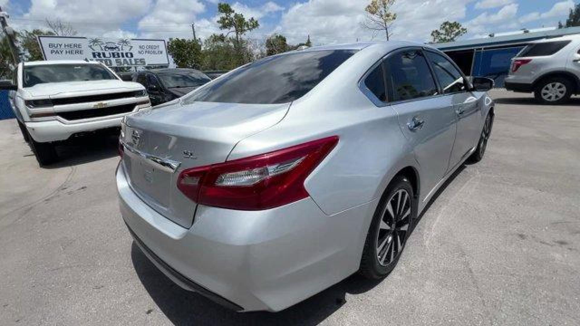 2018 Brilliant Silver /Charcoal Nissan Altima (1N4AL3AP7JC) with an 4 2.5 L engine, Variable transmission, located at 27610 S Dixie Hwy, Homestead, FL, 33032, (305) 749-2348, 25.510241, -80.438301 - Delivers 38 Highway MPG and 27 City MPG! This Nissan Altima boasts a Regular Unleaded I-4 2.5 L/152 engine powering this Variable transmission. CHARCOAL, LEATHER APPOINTED SEAT TRIM, BRILLIANT SILVER, [Z66] ACTIVATION DISCLAIMER.*This Nissan Altima Comes Equipped with These Options *[L92] FLOOR MATS - Photo#3