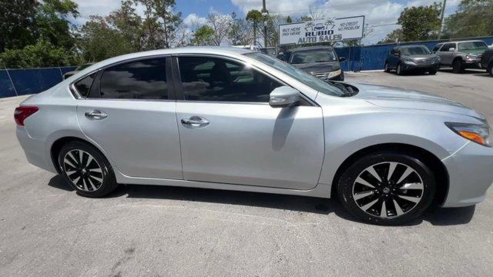 2018 Brilliant Silver /Charcoal Nissan Altima (1N4AL3AP7JC) with an 4 2.5 L engine, Variable transmission, located at 27610 S Dixie Hwy, Homestead, FL, 33032, (305) 749-2348, 25.510241, -80.438301 - Delivers 38 Highway MPG and 27 City MPG! This Nissan Altima boasts a Regular Unleaded I-4 2.5 L/152 engine powering this Variable transmission. CHARCOAL, LEATHER APPOINTED SEAT TRIM, BRILLIANT SILVER, [Z66] ACTIVATION DISCLAIMER.*This Nissan Altima Comes Equipped with These Options *[L92] FLOOR MATS - Photo#4