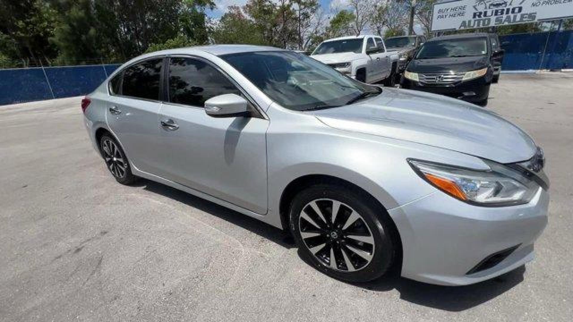 2018 Brilliant Silver /Charcoal Nissan Altima (1N4AL3AP7JC) with an 4 2.5 L engine, Variable transmission, located at 27610 S Dixie Hwy, Homestead, FL, 33032, (305) 749-2348, 25.510241, -80.438301 - Delivers 38 Highway MPG and 27 City MPG! This Nissan Altima boasts a Regular Unleaded I-4 2.5 L/152 engine powering this Variable transmission. CHARCOAL, LEATHER APPOINTED SEAT TRIM, BRILLIANT SILVER, [Z66] ACTIVATION DISCLAIMER.*This Nissan Altima Comes Equipped with These Options *[L92] FLOOR MATS - Photo#5