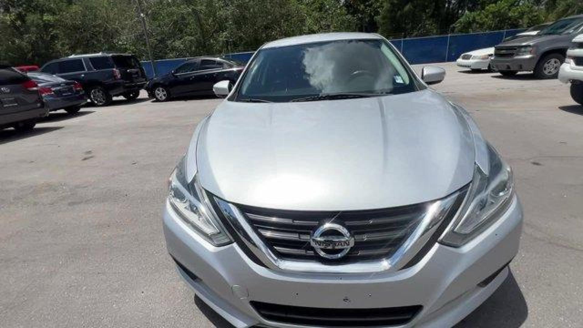 2018 Brilliant Silver /Charcoal Nissan Altima (1N4AL3AP7JC) with an 4 2.5 L engine, Variable transmission, located at 27610 S Dixie Hwy, Homestead, FL, 33032, (305) 749-2348, 25.510241, -80.438301 - Delivers 38 Highway MPG and 27 City MPG! This Nissan Altima boasts a Regular Unleaded I-4 2.5 L/152 engine powering this Variable transmission. CHARCOAL, LEATHER APPOINTED SEAT TRIM, BRILLIANT SILVER, [Z66] ACTIVATION DISCLAIMER.*This Nissan Altima Comes Equipped with These Options *[L92] FLOOR MATS - Photo#6