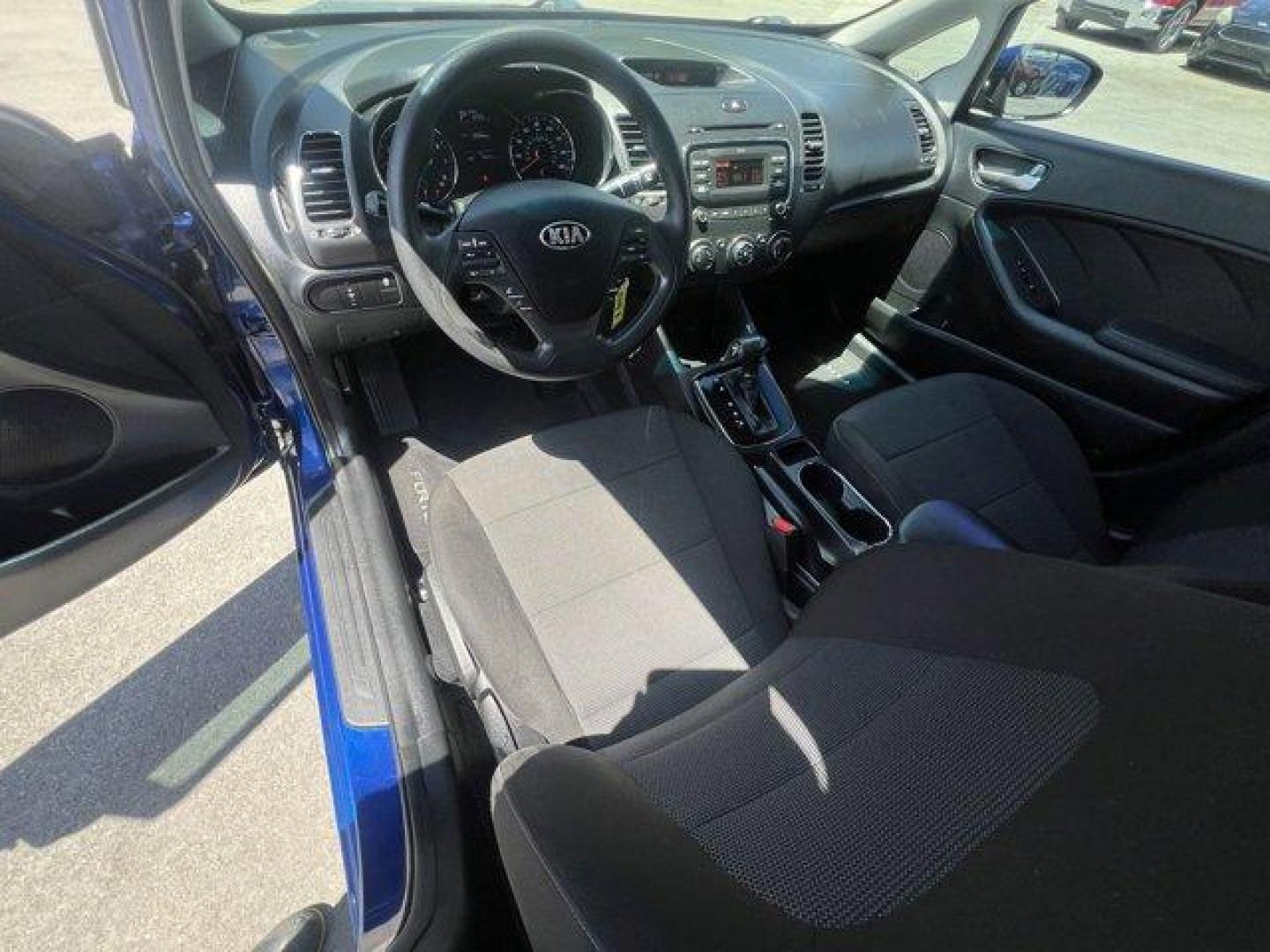 2018 Deep Sea Blue /Black Kia Forte (3KPFK4A74JE) with an 4 2.0 L engine, Automatic transmission, located at 27610 S Dixie Hwy, Homestead, FL, 33032, (305) 749-2348, 25.510241, -80.438301 - Scores 37 Highway MPG and 29 City MPG! This Kia Forte delivers a Regular Unleaded I-4 2.0 L/122 engine powering this Automatic transmission. DEEP SEA BLUE, CARPETED FLOOR MATS, BLACK, PREMIUM CLOTH SEAT TRIM.* This Kia Forte Features the Following Options *BLACK, CLOTH SEAT TRIM, Window Grid Antenna - Photo#11