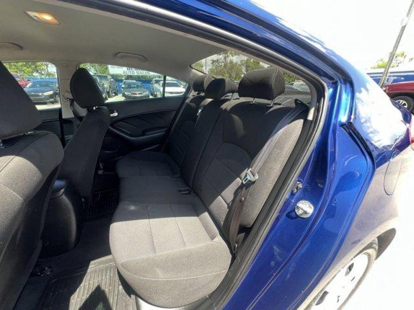 2018 Deep Sea Blue /Black Kia Forte (3KPFK4A74JE) with an 4 2.0 L engine, Automatic transmission, located at 27610 S Dixie Hwy, Homestead, FL, 33032, (305) 749-2348, 25.510241, -80.438301 - Scores 37 Highway MPG and 29 City MPG! This Kia Forte delivers a Regular Unleaded I-4 2.0 L/122 engine powering this Automatic transmission. DEEP SEA BLUE, CARPETED FLOOR MATS, BLACK, PREMIUM CLOTH SEAT TRIM.* This Kia Forte Features the Following Options *BLACK, CLOTH SEAT TRIM, Window Grid Antenna - Photo#13