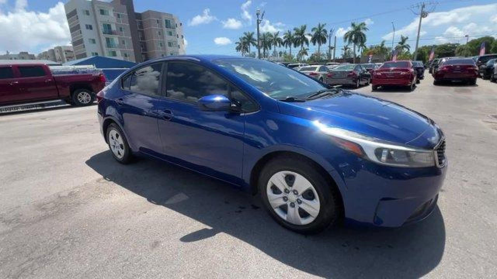 2018 Deep Sea Blue /Black Kia Forte (3KPFK4A74JE) with an 4 2.0 L engine, Automatic transmission, located at 27610 S Dixie Hwy, Homestead, FL, 33032, (305) 749-2348, 25.510241, -80.438301 - Scores 37 Highway MPG and 29 City MPG! This Kia Forte delivers a Regular Unleaded I-4 2.0 L/122 engine powering this Automatic transmission. DEEP SEA BLUE, CARPETED FLOOR MATS, BLACK, PREMIUM CLOTH SEAT TRIM.* This Kia Forte Features the Following Options *BLACK, CLOTH SEAT TRIM, Window Grid Antenna - Photo#6