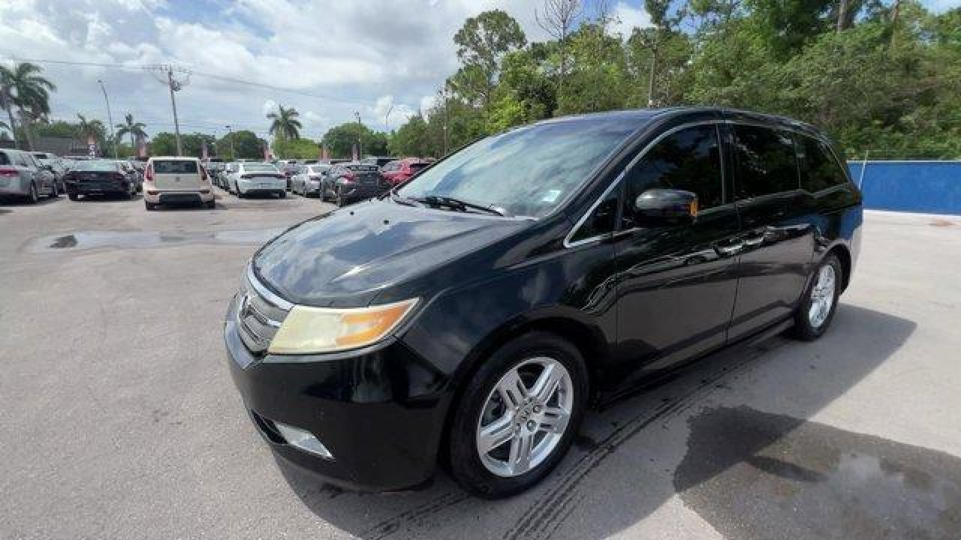 2012 Black Honda Odyssey (5FNRL5H96CB) with an 6 3.5L engine, Automatic transmission, located at 27610 S Dixie Hwy, Homestead, FL, 33032, (305) 749-2348, 25.510241, -80.438301 - KBB.com 10 Best Used Family Cars Under $15,000. Scores 28 Highway MPG and 19 City MPG! This Honda Odyssey boasts a Gas V6 3.5L/212 engine powering this Automatic transmission. XM Radio (subscription required), Wide-mode adjustable 2nd-row seats -inc: leather trimmed outboard seats, multi-function ce - Photo#0