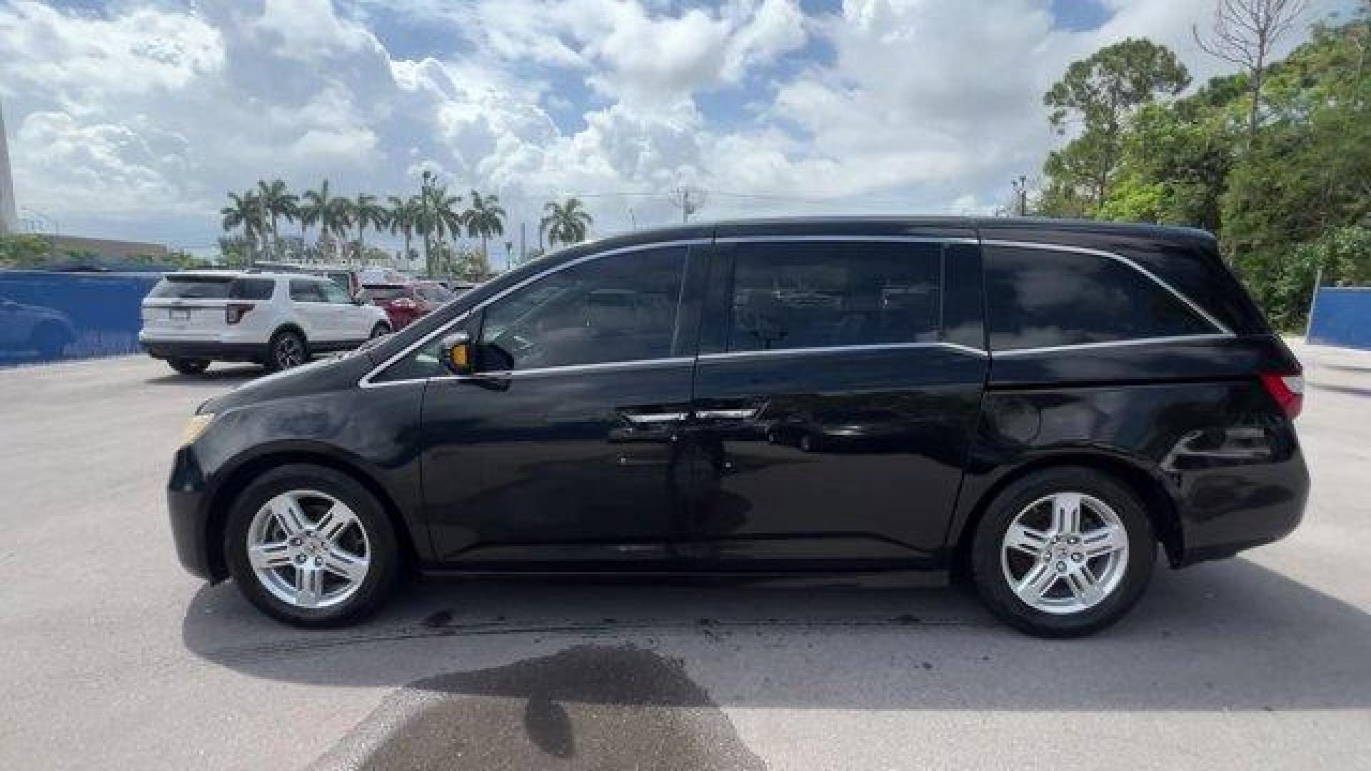 2012 Black Honda Odyssey (5FNRL5H96CB) with an 6 3.5L engine, Automatic transmission, located at 27610 S Dixie Hwy, Homestead, FL, 33032, (305) 749-2348, 25.510241, -80.438301 - KBB.com 10 Best Used Family Cars Under $15,000. Scores 28 Highway MPG and 19 City MPG! This Honda Odyssey boasts a Gas V6 3.5L/212 engine powering this Automatic transmission. XM Radio (subscription required), Wide-mode adjustable 2nd-row seats -inc: leather trimmed outboard seats, multi-function ce - Photo#1