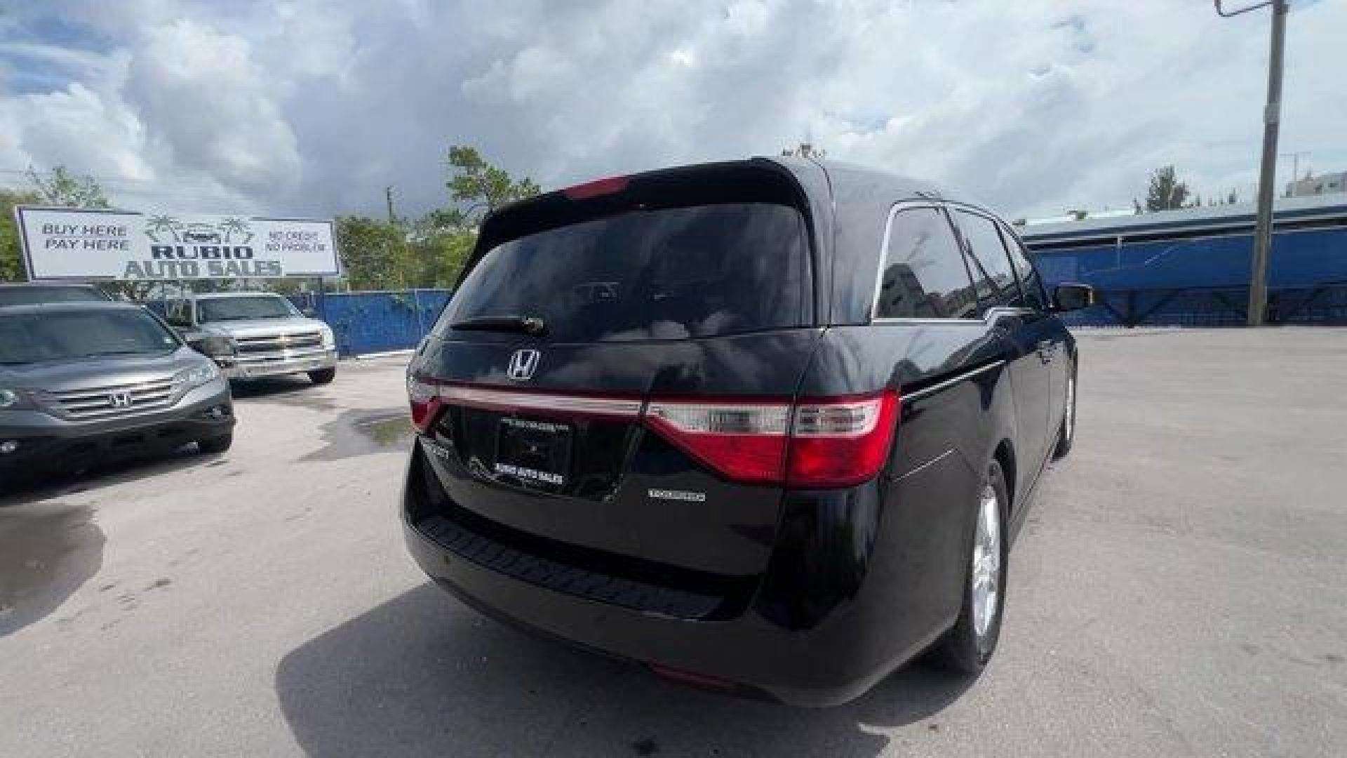 2012 Black Honda Odyssey (5FNRL5H96CB) with an 6 3.5L engine, Automatic transmission, located at 27610 S Dixie Hwy, Homestead, FL, 33032, (305) 749-2348, 25.510241, -80.438301 - KBB.com 10 Best Used Family Cars Under $15,000. Scores 28 Highway MPG and 19 City MPG! This Honda Odyssey boasts a Gas V6 3.5L/212 engine powering this Automatic transmission. XM Radio (subscription required), Wide-mode adjustable 2nd-row seats -inc: leather trimmed outboard seats, multi-function ce - Photo#4