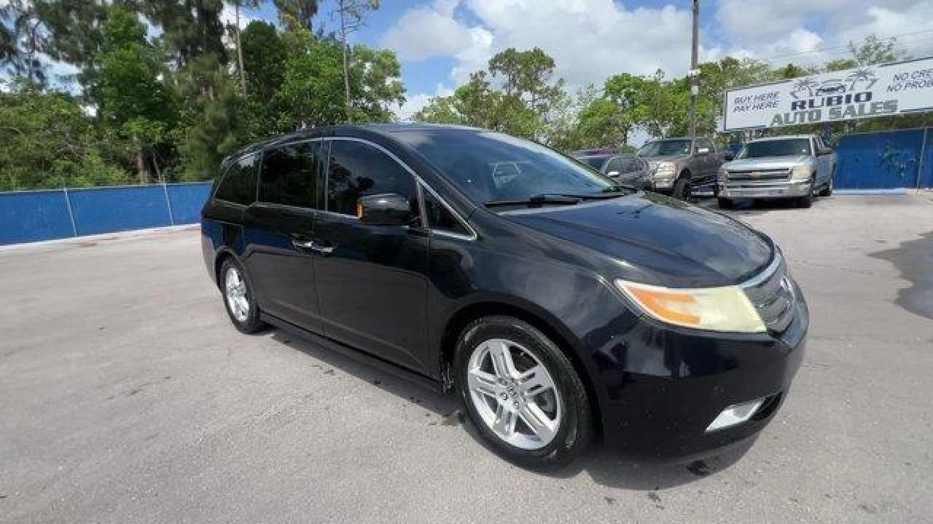 2012 Black Honda Odyssey (5FNRL5H96CB) with an 6 3.5L engine, Automatic transmission, located at 27610 S Dixie Hwy, Homestead, FL, 33032, (305) 749-2348, 25.510241, -80.438301 - KBB.com 10 Best Used Family Cars Under $15,000. Scores 28 Highway MPG and 19 City MPG! This Honda Odyssey boasts a Gas V6 3.5L/212 engine powering this Automatic transmission. XM Radio (subscription required), Wide-mode adjustable 2nd-row seats -inc: leather trimmed outboard seats, multi-function ce - Photo#6