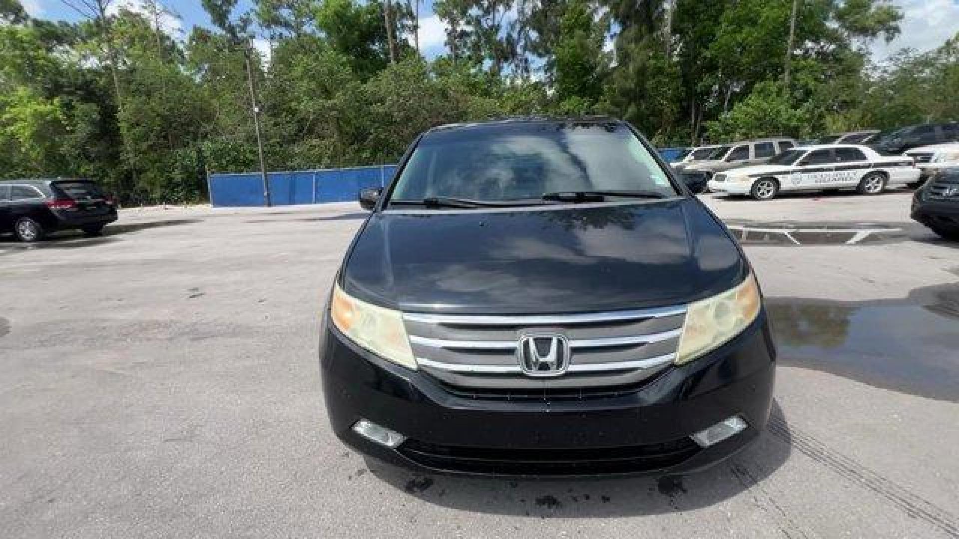 2012 Black Honda Odyssey (5FNRL5H96CB) with an 6 3.5L engine, Automatic transmission, located at 27610 S Dixie Hwy, Homestead, FL, 33032, (305) 749-2348, 25.510241, -80.438301 - KBB.com 10 Best Used Family Cars Under $15,000. Scores 28 Highway MPG and 19 City MPG! This Honda Odyssey boasts a Gas V6 3.5L/212 engine powering this Automatic transmission. XM Radio (subscription required), Wide-mode adjustable 2nd-row seats -inc: leather trimmed outboard seats, multi-function ce - Photo#7