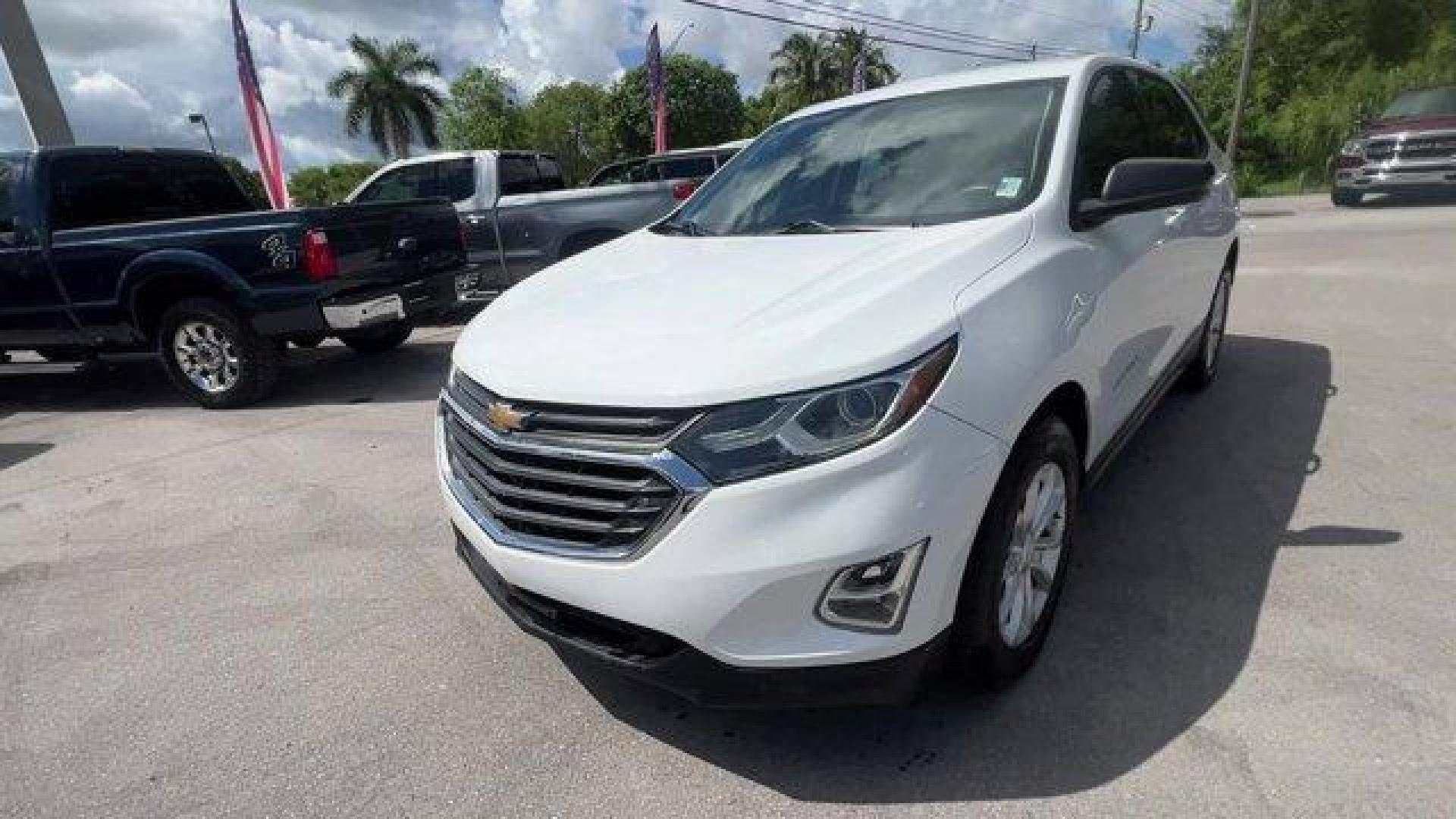 2018 Summit White /Medium Ash Gray Chevrolet Equinox (2GNAXHEV4J6) with an 4 1.5L engine, Automatic transmission, located at 27610 S Dixie Hwy, Homestead, FL, 33032, (305) 749-2348, 25.510241, -80.438301 - KBB.com 10 Best SUVs Under $25,000. Scores 32 Highway MPG and 26 City MPG! This Chevrolet Equinox boasts a Turbocharged Gas I4 1.5L/ engine powering this Automatic transmission. WHEELS, 17 (43.2 CM) ALUMINUM (STD), TRANSMISSION, 6-SPEED AUTOMATIC, ELECTRONICALLY-CONTROLLED WITH OVERDRIVE includes Dr - Photo#0