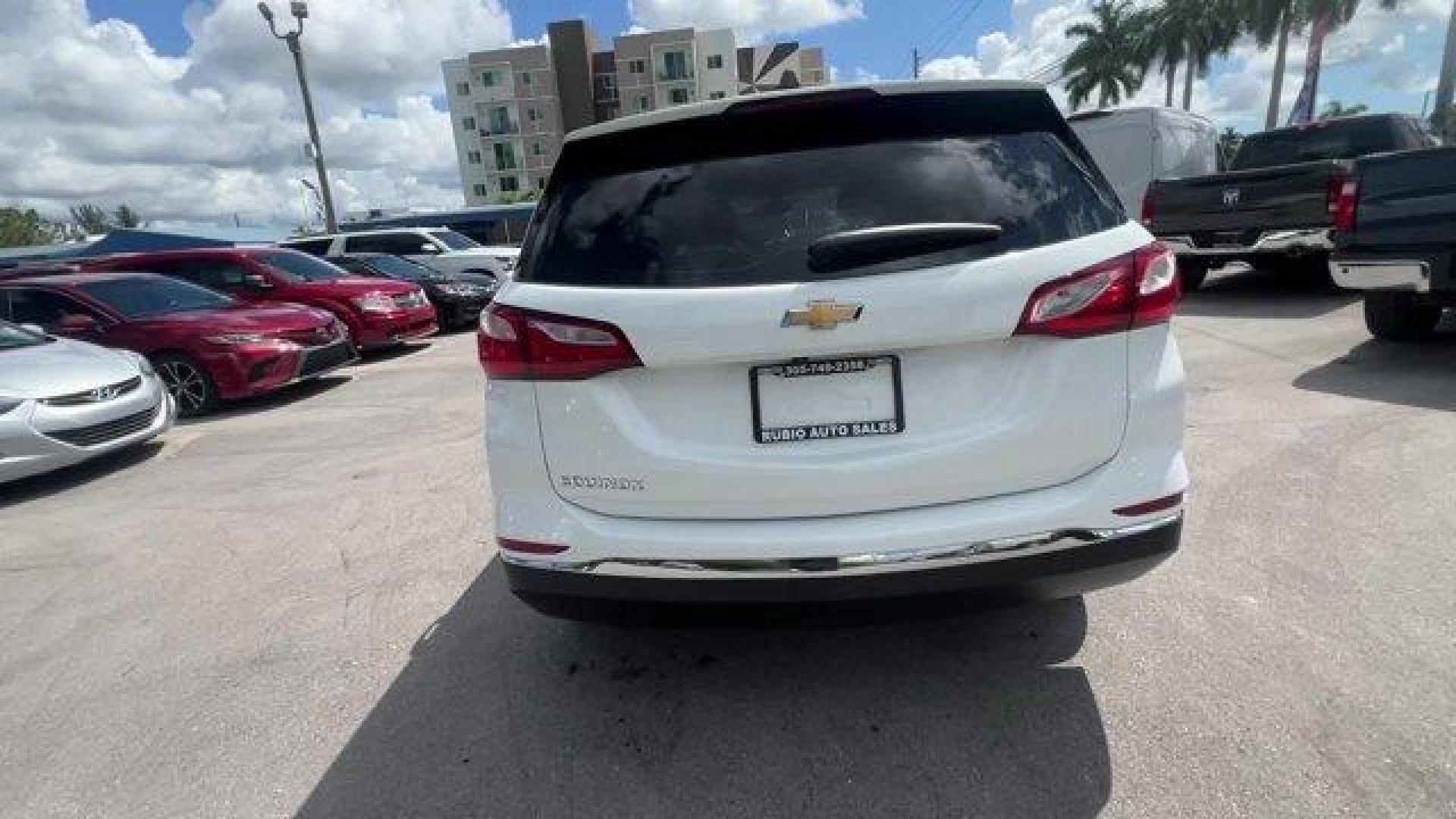 2018 Summit White /Medium Ash Gray Chevrolet Equinox (2GNAXHEV4J6) with an 4 1.5L engine, Automatic transmission, located at 27610 S Dixie Hwy, Homestead, FL, 33032, (305) 749-2348, 25.510241, -80.438301 - KBB.com 10 Best SUVs Under $25,000. Scores 32 Highway MPG and 26 City MPG! This Chevrolet Equinox boasts a Turbocharged Gas I4 1.5L/ engine powering this Automatic transmission. WHEELS, 17 (43.2 CM) ALUMINUM (STD), TRANSMISSION, 6-SPEED AUTOMATIC, ELECTRONICALLY-CONTROLLED WITH OVERDRIVE includes Dr - Photo#3