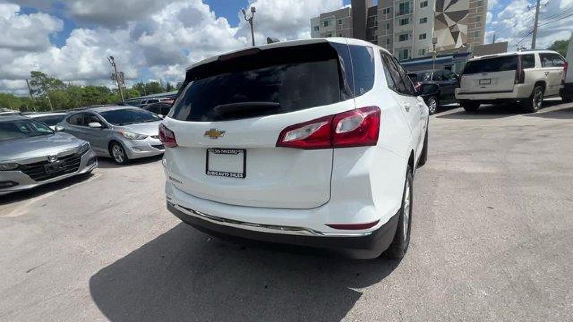 2018 Summit White /Medium Ash Gray Chevrolet Equinox (2GNAXHEV4J6) with an 4 1.5L engine, Automatic transmission, located at 27610 S Dixie Hwy, Homestead, FL, 33032, (305) 749-2348, 25.510241, -80.438301 - KBB.com 10 Best SUVs Under $25,000. Scores 32 Highway MPG and 26 City MPG! This Chevrolet Equinox boasts a Turbocharged Gas I4 1.5L/ engine powering this Automatic transmission. WHEELS, 17 (43.2 CM) ALUMINUM (STD), TRANSMISSION, 6-SPEED AUTOMATIC, ELECTRONICALLY-CONTROLLED WITH OVERDRIVE includes Dr - Photo#4