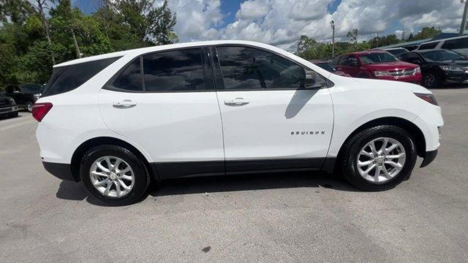 2018 Summit White /Medium Ash Gray Chevrolet Equinox (2GNAXHEV4J6) with an 4 1.5L engine, Automatic transmission, located at 27610 S Dixie Hwy, Homestead, FL, 33032, (305) 749-2348, 25.510241, -80.438301 - KBB.com 10 Best SUVs Under $25,000. Scores 32 Highway MPG and 26 City MPG! This Chevrolet Equinox boasts a Turbocharged Gas I4 1.5L/ engine powering this Automatic transmission. WHEELS, 17 (43.2 CM) ALUMINUM (STD), TRANSMISSION, 6-SPEED AUTOMATIC, ELECTRONICALLY-CONTROLLED WITH OVERDRIVE includes Dr - Photo#5