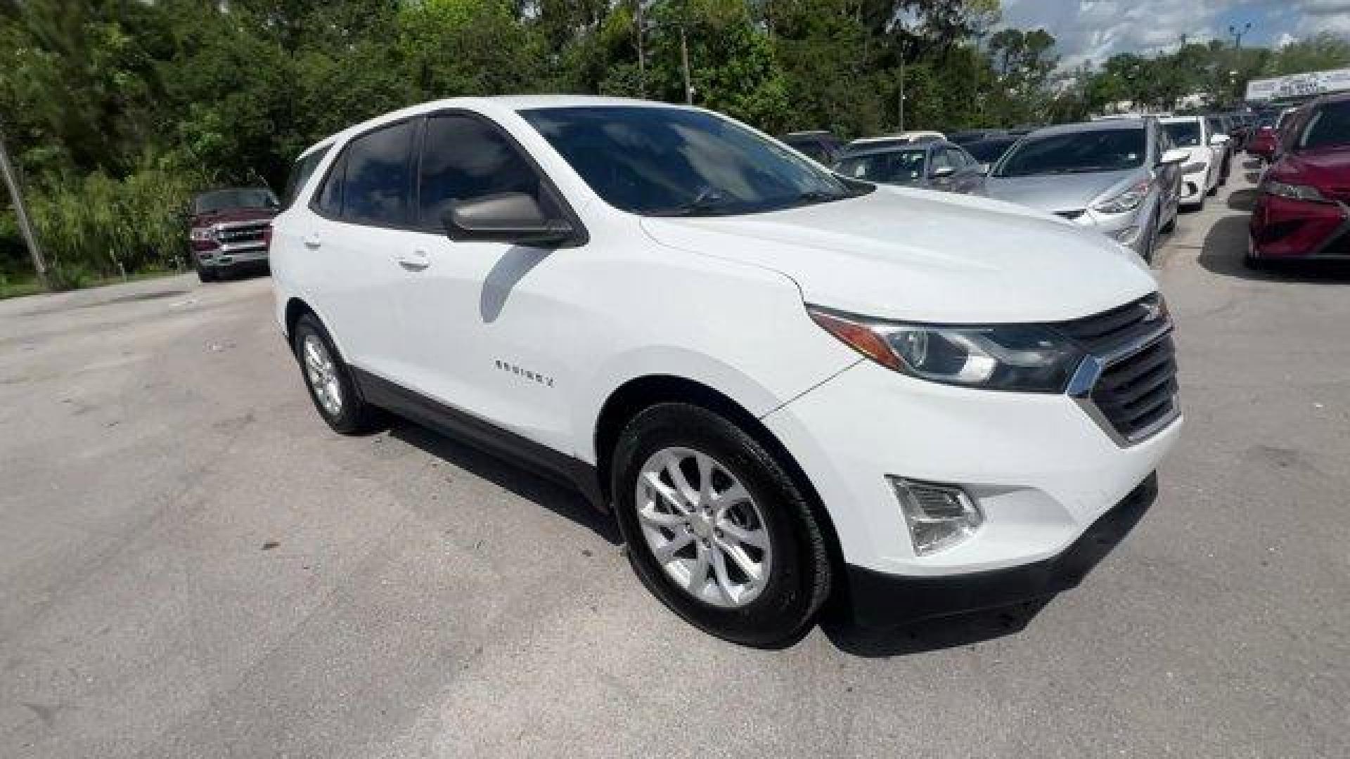 2018 Summit White /Medium Ash Gray Chevrolet Equinox (2GNAXHEV4J6) with an 4 1.5L engine, Automatic transmission, located at 27610 S Dixie Hwy, Homestead, FL, 33032, (305) 749-2348, 25.510241, -80.438301 - KBB.com 10 Best SUVs Under $25,000. Scores 32 Highway MPG and 26 City MPG! This Chevrolet Equinox boasts a Turbocharged Gas I4 1.5L/ engine powering this Automatic transmission. WHEELS, 17 (43.2 CM) ALUMINUM (STD), TRANSMISSION, 6-SPEED AUTOMATIC, ELECTRONICALLY-CONTROLLED WITH OVERDRIVE includes Dr - Photo#6