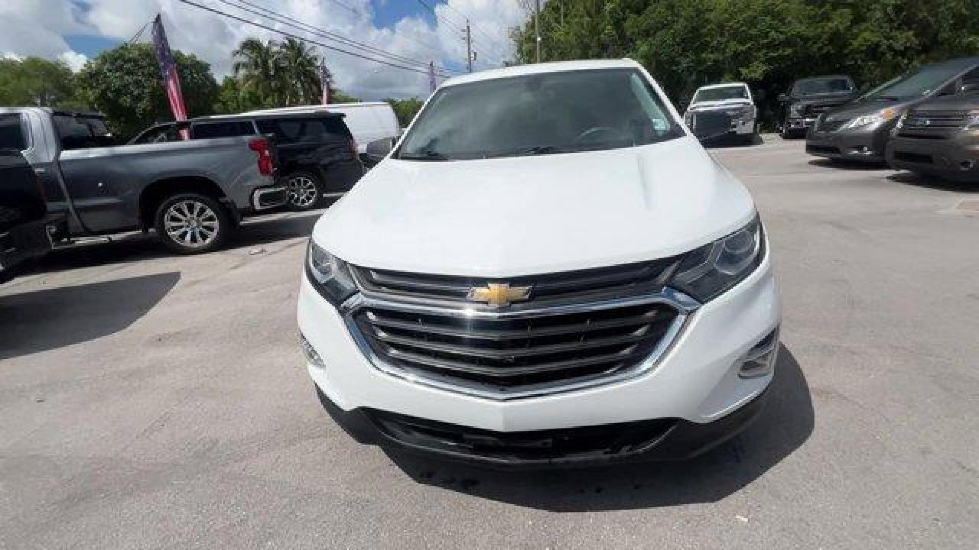 2018 Summit White /Medium Ash Gray Chevrolet Equinox (2GNAXHEV4J6) with an 4 1.5L engine, Automatic transmission, located at 27610 S Dixie Hwy, Homestead, FL, 33032, (305) 749-2348, 25.510241, -80.438301 - KBB.com 10 Best SUVs Under $25,000. Scores 32 Highway MPG and 26 City MPG! This Chevrolet Equinox boasts a Turbocharged Gas I4 1.5L/ engine powering this Automatic transmission. WHEELS, 17 (43.2 CM) ALUMINUM (STD), TRANSMISSION, 6-SPEED AUTOMATIC, ELECTRONICALLY-CONTROLLED WITH OVERDRIVE includes Dr - Photo#7