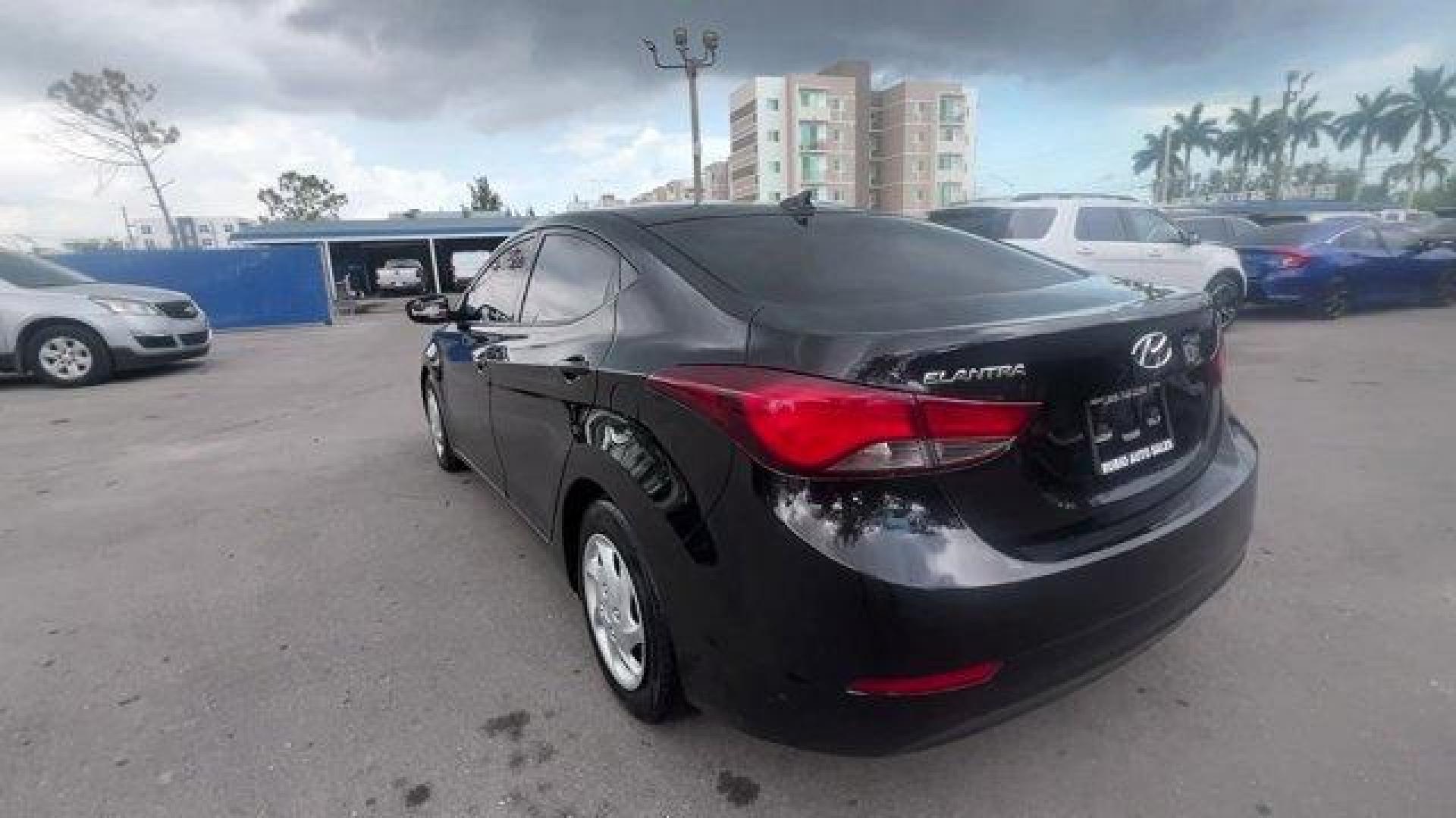 2016 Phantom Black /Gray Hyundai Elantra (5NPDH4AE4GH) with an 4 1.8 L engine, Automatic transmission, located at 27610 S Dixie Hwy, Homestead, FL, 33032, (305) 749-2348, 25.510241, -80.438301 - KBB.com Best Buy Awards Finalist. Only 93,329 Miles! Delivers 38 Highway MPG and 28 City MPG! This Hyundai Elantra boasts a Regular Unleaded I-4 1.8 L/110 engine powering this Automatic transmission. REAR BUMPER APPLIQUE, PHANTOM BLACK, GRAY, PREMIUM CLOTH SEAT TRIM.*This Hyundai Elantra Comes Equip - Photo#2