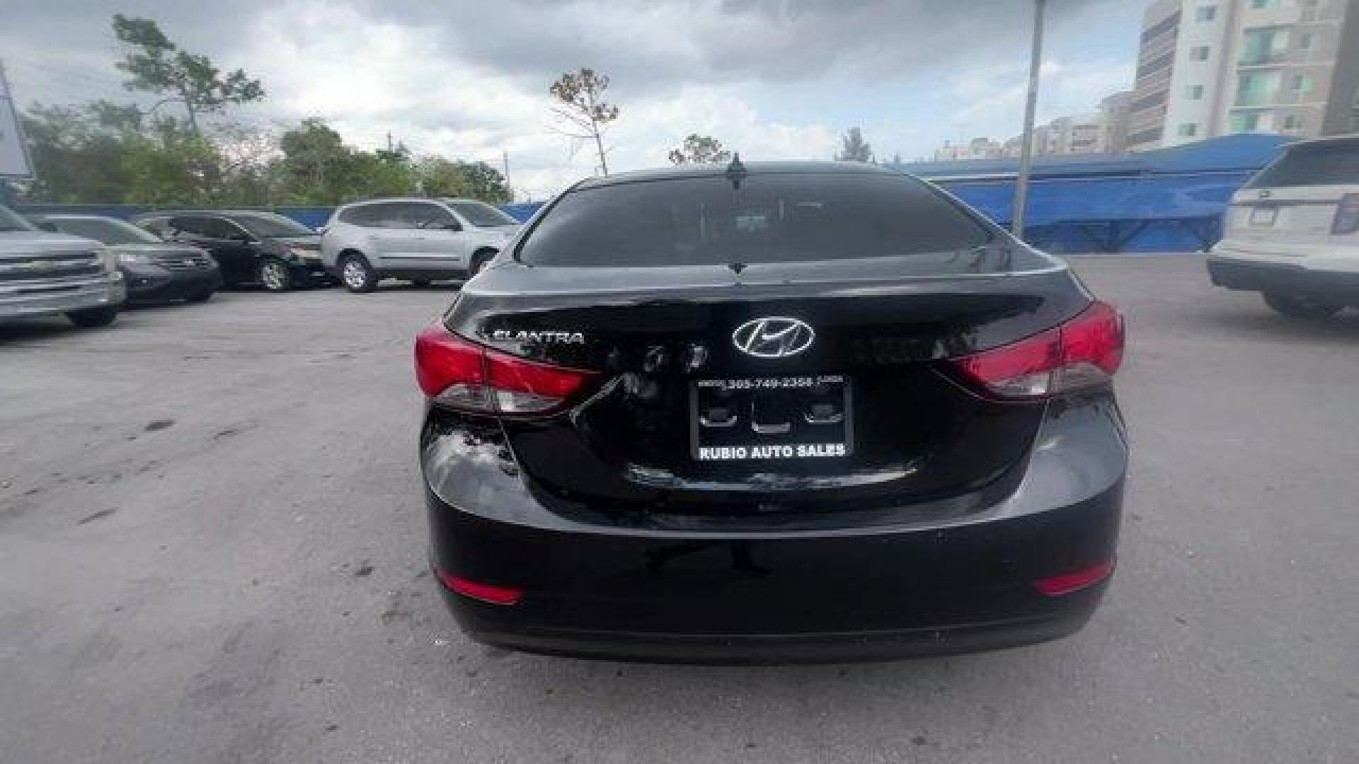 2016 Phantom Black /Gray Hyundai Elantra (5NPDH4AE4GH) with an 4 1.8 L engine, Automatic transmission, located at 27610 S Dixie Hwy, Homestead, FL, 33032, (305) 749-2348, 25.510241, -80.438301 - KBB.com Best Buy Awards Finalist. Only 93,329 Miles! Delivers 38 Highway MPG and 28 City MPG! This Hyundai Elantra boasts a Regular Unleaded I-4 1.8 L/110 engine powering this Automatic transmission. REAR BUMPER APPLIQUE, PHANTOM BLACK, GRAY, PREMIUM CLOTH SEAT TRIM.*This Hyundai Elantra Comes Equip - Photo#3