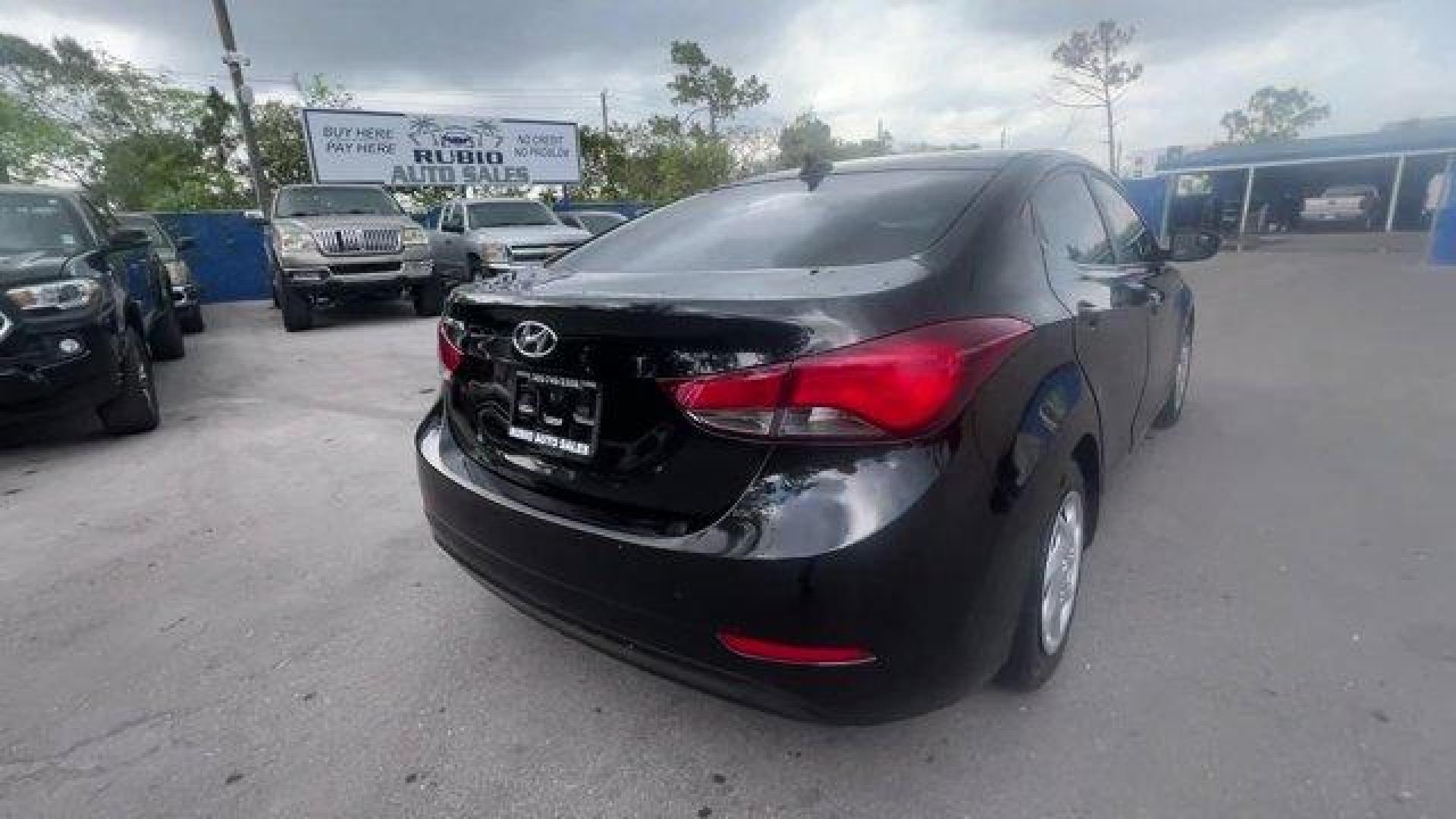 2016 Phantom Black /Gray Hyundai Elantra (5NPDH4AE4GH) with an 4 1.8 L engine, Automatic transmission, located at 27610 S Dixie Hwy, Homestead, FL, 33032, (305) 749-2348, 25.510241, -80.438301 - KBB.com Best Buy Awards Finalist. Only 93,329 Miles! Delivers 38 Highway MPG and 28 City MPG! This Hyundai Elantra boasts a Regular Unleaded I-4 1.8 L/110 engine powering this Automatic transmission. REAR BUMPER APPLIQUE, PHANTOM BLACK, GRAY, PREMIUM CLOTH SEAT TRIM.*This Hyundai Elantra Comes Equip - Photo#4