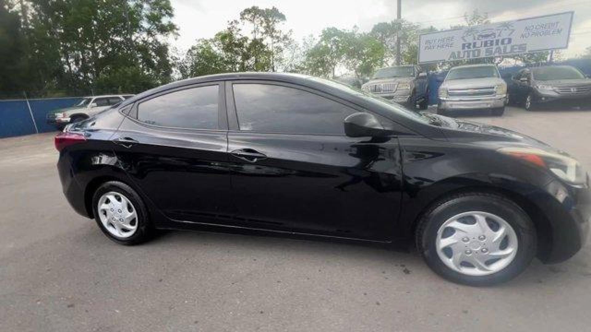 2016 Phantom Black /Gray Hyundai Elantra (5NPDH4AE4GH) with an 4 1.8 L engine, Automatic transmission, located at 27610 S Dixie Hwy, Homestead, FL, 33032, (305) 749-2348, 25.510241, -80.438301 - KBB.com Best Buy Awards Finalist. Only 93,329 Miles! Delivers 38 Highway MPG and 28 City MPG! This Hyundai Elantra boasts a Regular Unleaded I-4 1.8 L/110 engine powering this Automatic transmission. REAR BUMPER APPLIQUE, PHANTOM BLACK, GRAY, PREMIUM CLOTH SEAT TRIM.*This Hyundai Elantra Comes Equip - Photo#5