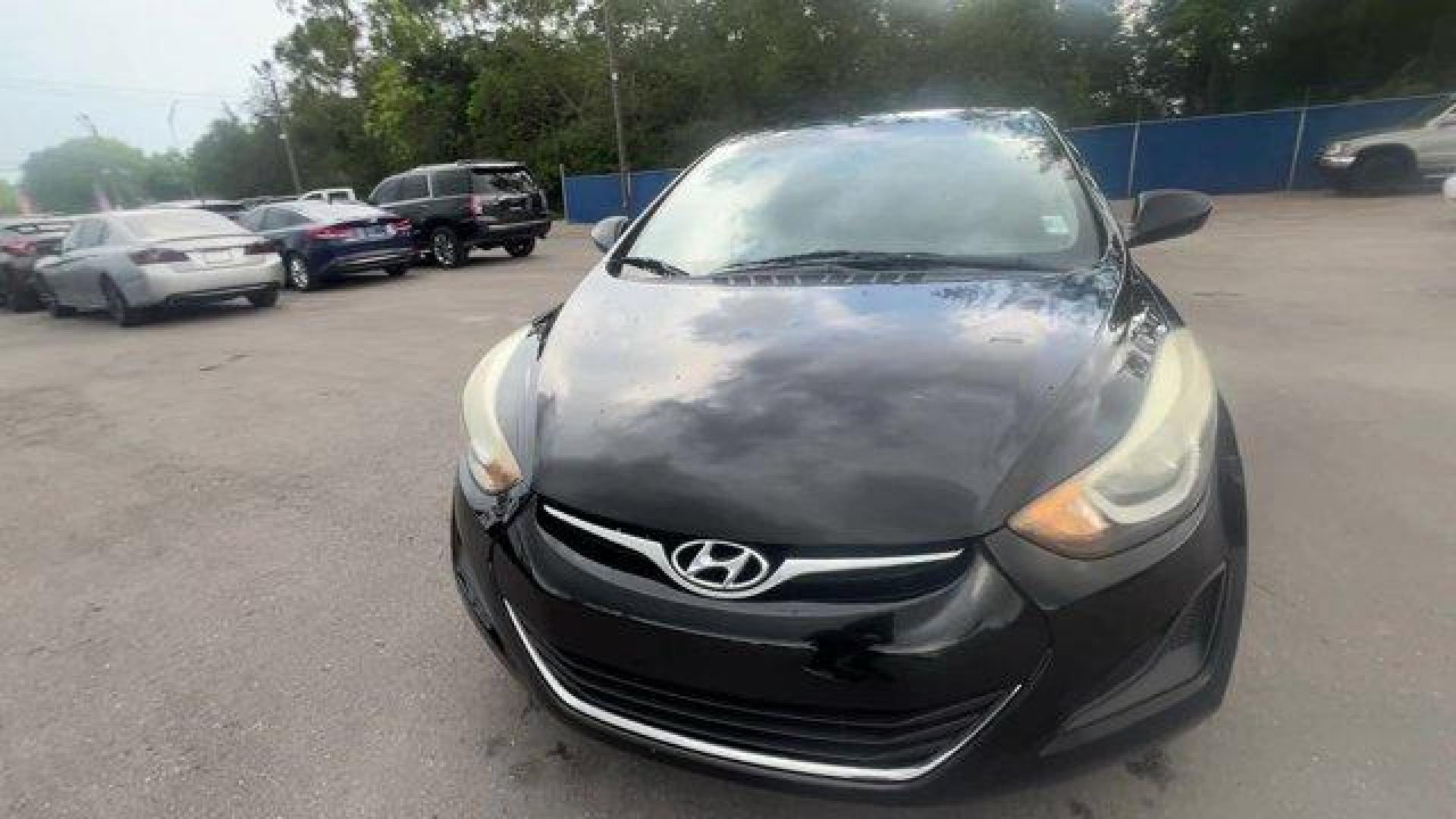 2016 Phantom Black /Gray Hyundai Elantra (5NPDH4AE4GH) with an 4 1.8 L engine, Automatic transmission, located at 27610 S Dixie Hwy, Homestead, FL, 33032, (305) 749-2348, 25.510241, -80.438301 - KBB.com Best Buy Awards Finalist. Only 93,329 Miles! Delivers 38 Highway MPG and 28 City MPG! This Hyundai Elantra boasts a Regular Unleaded I-4 1.8 L/110 engine powering this Automatic transmission. REAR BUMPER APPLIQUE, PHANTOM BLACK, GRAY, PREMIUM CLOTH SEAT TRIM.*This Hyundai Elantra Comes Equip - Photo#7