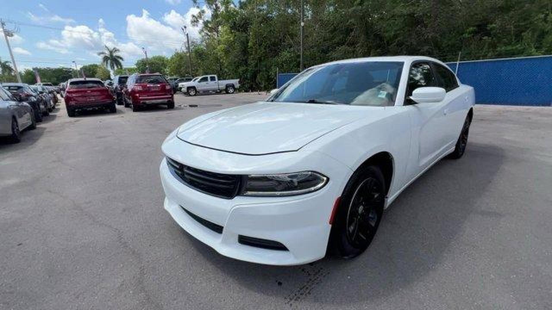 2020 White Knuckle Clearcoat /Black Dodge Charger (2C3CDXBG0LH) with an 6 3.6 L engine, Automatic transmission, located at 27610 S Dixie Hwy, Homestead, FL, 33032, (305) 749-2348, 25.510241, -80.438301 - Boasts 30 Highway MPG and 19 City MPG! This Dodge Charger boasts a Regular Unleaded V-6 3.6 L/220 engine powering this Automatic transmission. WHITE KNUCKLE CLEARCOAT, WHEELS: 17 X 7.0 PAINTED CAST ALUMINUM (STD), TRANSMISSION: 8-SPEED AUTOMATIC (8HP50) (STD).*This Dodge Charger Comes Equipped with - Photo#0