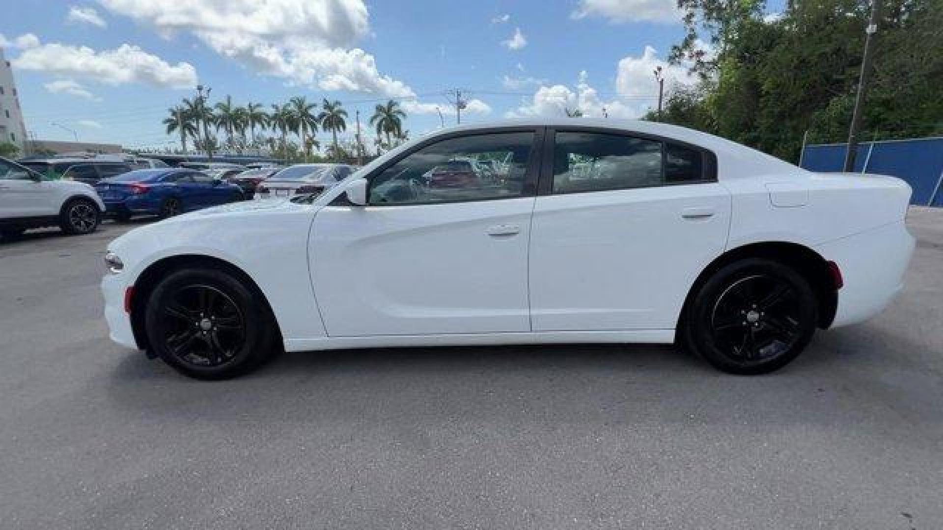 2020 White Knuckle Clearcoat /Black Dodge Charger (2C3CDXBG0LH) with an 6 3.6 L engine, Automatic transmission, located at 27610 S Dixie Hwy, Homestead, FL, 33032, (305) 749-2348, 25.510241, -80.438301 - Boasts 30 Highway MPG and 19 City MPG! This Dodge Charger boasts a Regular Unleaded V-6 3.6 L/220 engine powering this Automatic transmission. WHITE KNUCKLE CLEARCOAT, WHEELS: 17 X 7.0 PAINTED CAST ALUMINUM (STD), TRANSMISSION: 8-SPEED AUTOMATIC (8HP50) (STD).*This Dodge Charger Comes Equipped with - Photo#1