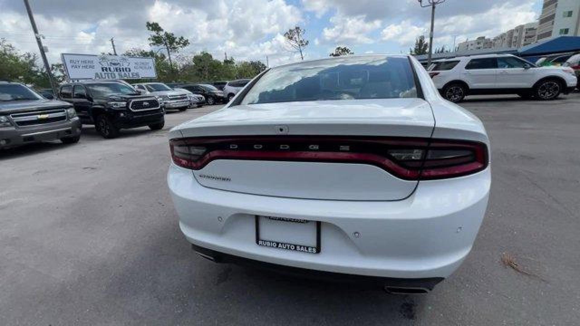 2020 White Knuckle Clearcoat /Black Dodge Charger (2C3CDXBG0LH) with an 6 3.6 L engine, Automatic transmission, located at 27610 S Dixie Hwy, Homestead, FL, 33032, (305) 749-2348, 25.510241, -80.438301 - Boasts 30 Highway MPG and 19 City MPG! This Dodge Charger boasts a Regular Unleaded V-6 3.6 L/220 engine powering this Automatic transmission. WHITE KNUCKLE CLEARCOAT, WHEELS: 17 X 7.0 PAINTED CAST ALUMINUM (STD), TRANSMISSION: 8-SPEED AUTOMATIC (8HP50) (STD).*This Dodge Charger Comes Equipped with - Photo#3