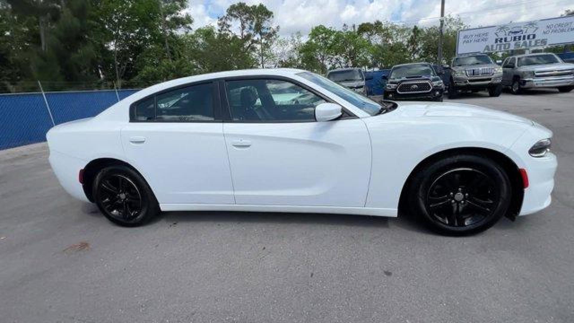 2020 White Knuckle Clearcoat /Black Dodge Charger (2C3CDXBG0LH) with an 6 3.6 L engine, Automatic transmission, located at 27610 S Dixie Hwy, Homestead, FL, 33032, (305) 749-2348, 25.510241, -80.438301 - Boasts 30 Highway MPG and 19 City MPG! This Dodge Charger boasts a Regular Unleaded V-6 3.6 L/220 engine powering this Automatic transmission. WHITE KNUCKLE CLEARCOAT, WHEELS: 17 X 7.0 PAINTED CAST ALUMINUM (STD), TRANSMISSION: 8-SPEED AUTOMATIC (8HP50) (STD).*This Dodge Charger Comes Equipped with - Photo#5