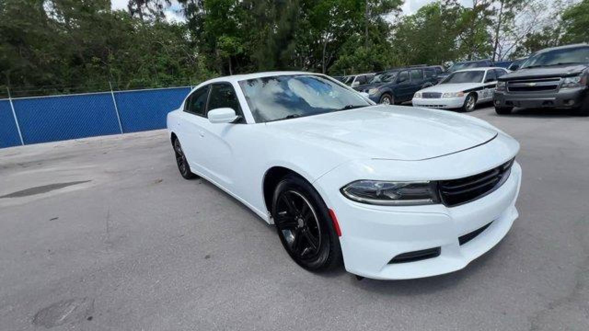 2020 White Knuckle Clearcoat /Black Dodge Charger (2C3CDXBG0LH) with an 6 3.6 L engine, Automatic transmission, located at 27610 S Dixie Hwy, Homestead, FL, 33032, (305) 749-2348, 25.510241, -80.438301 - Boasts 30 Highway MPG and 19 City MPG! This Dodge Charger boasts a Regular Unleaded V-6 3.6 L/220 engine powering this Automatic transmission. WHITE KNUCKLE CLEARCOAT, WHEELS: 17 X 7.0 PAINTED CAST ALUMINUM (STD), TRANSMISSION: 8-SPEED AUTOMATIC (8HP50) (STD).*This Dodge Charger Comes Equipped with - Photo#6